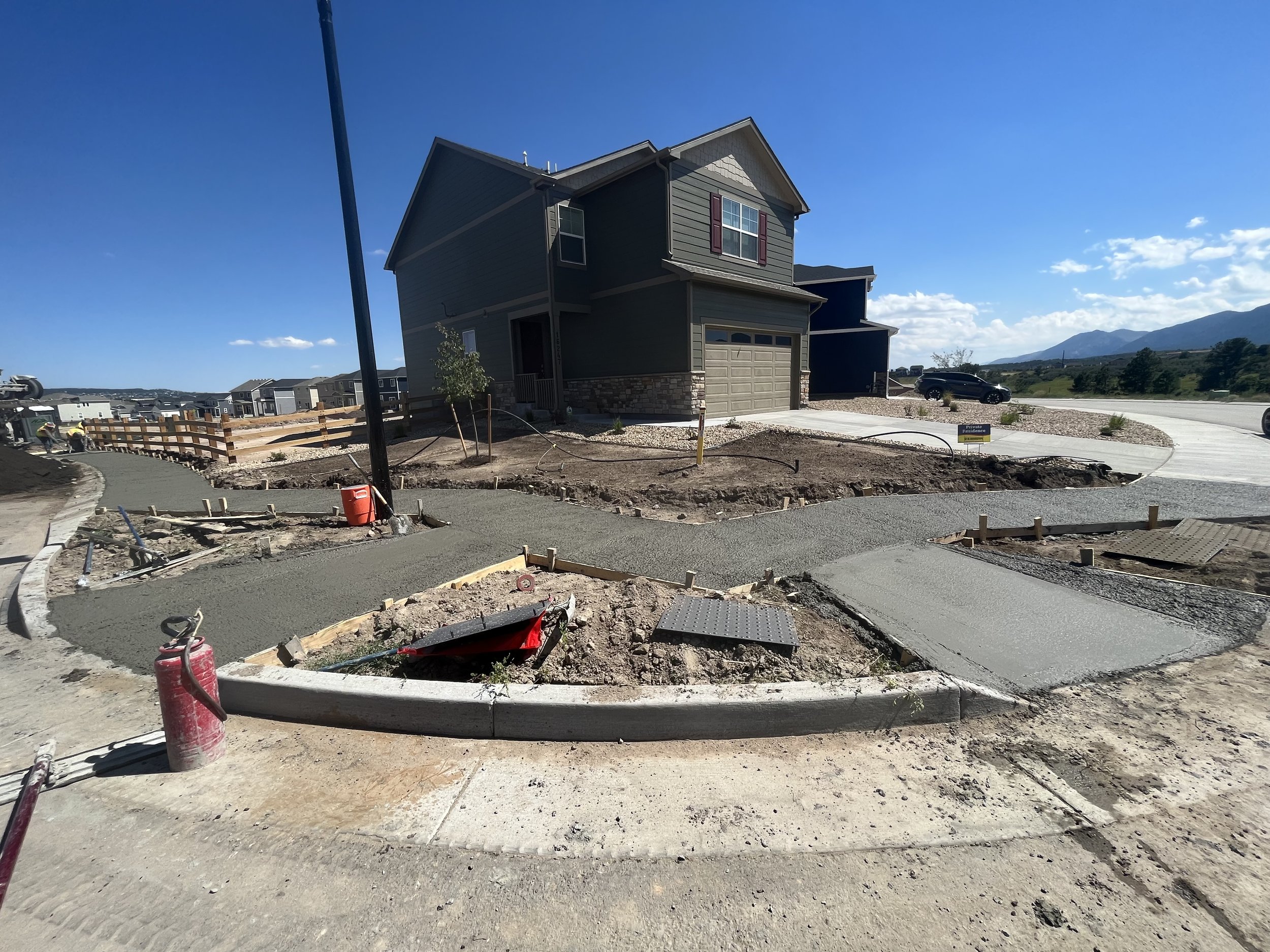 Single-family-home community concrete sidewalks.