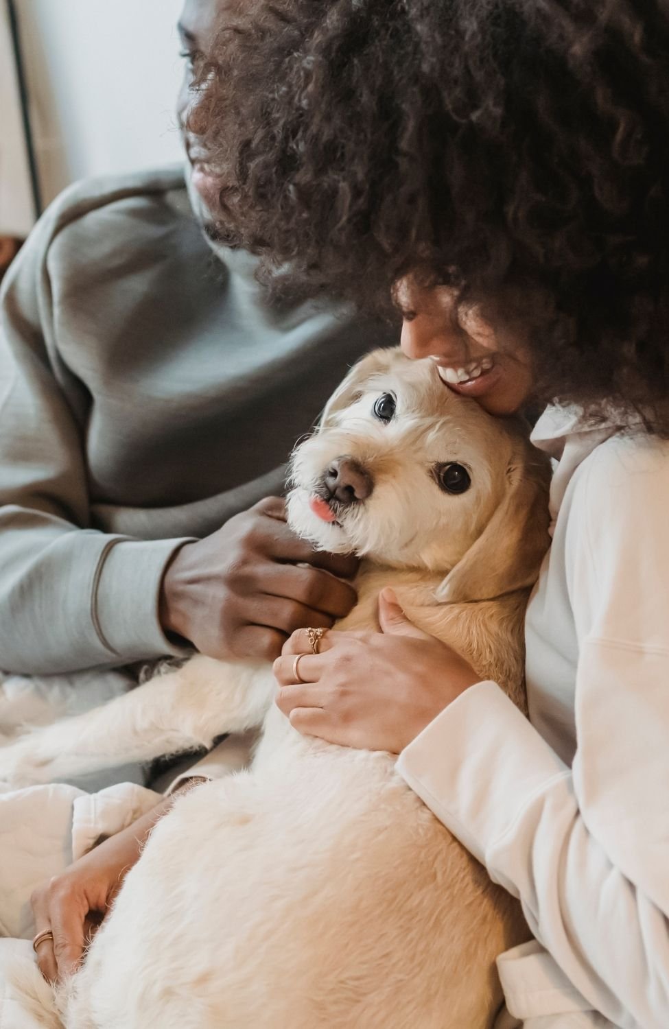 A family saying goodbye to their dog before humane, in-home pet euthanasia in Vancouver