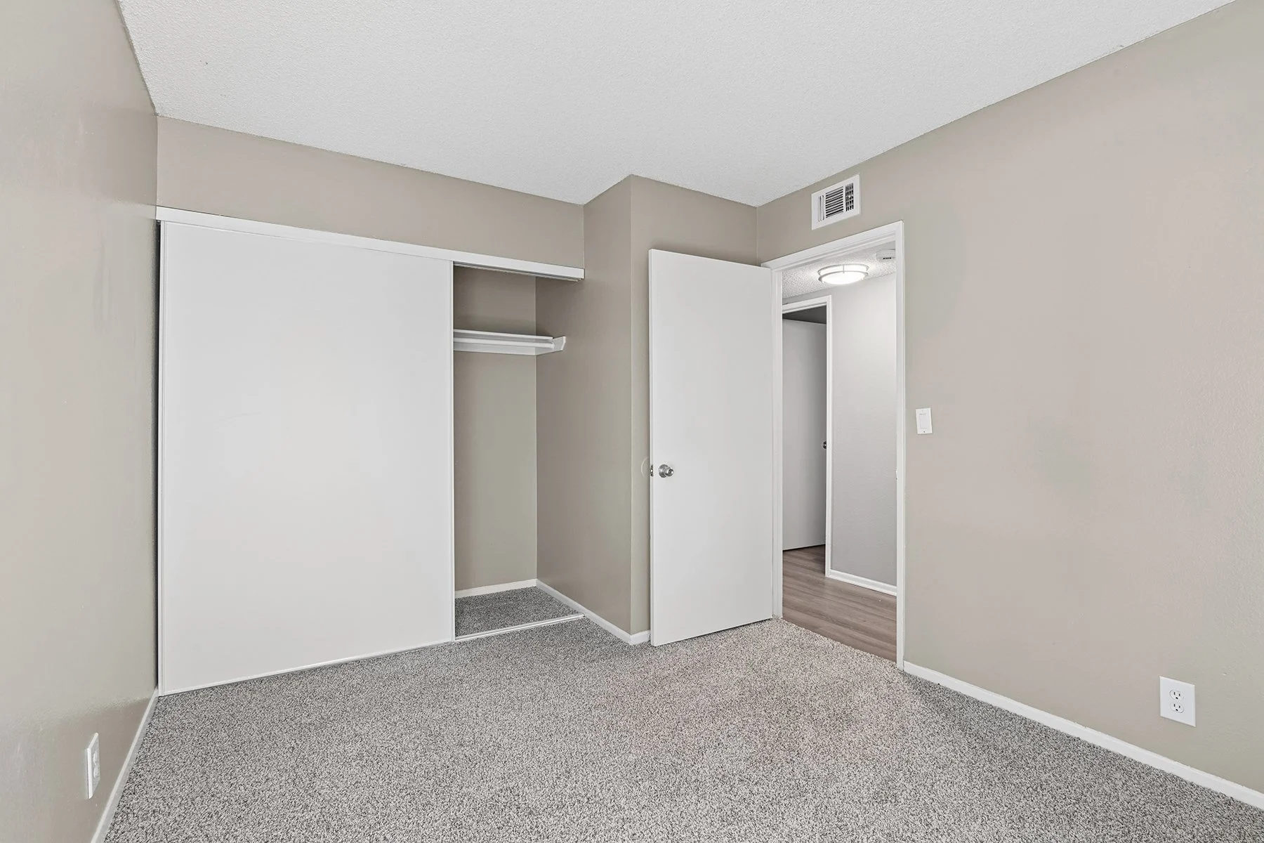 Carpeted Bedroom with Large Closet