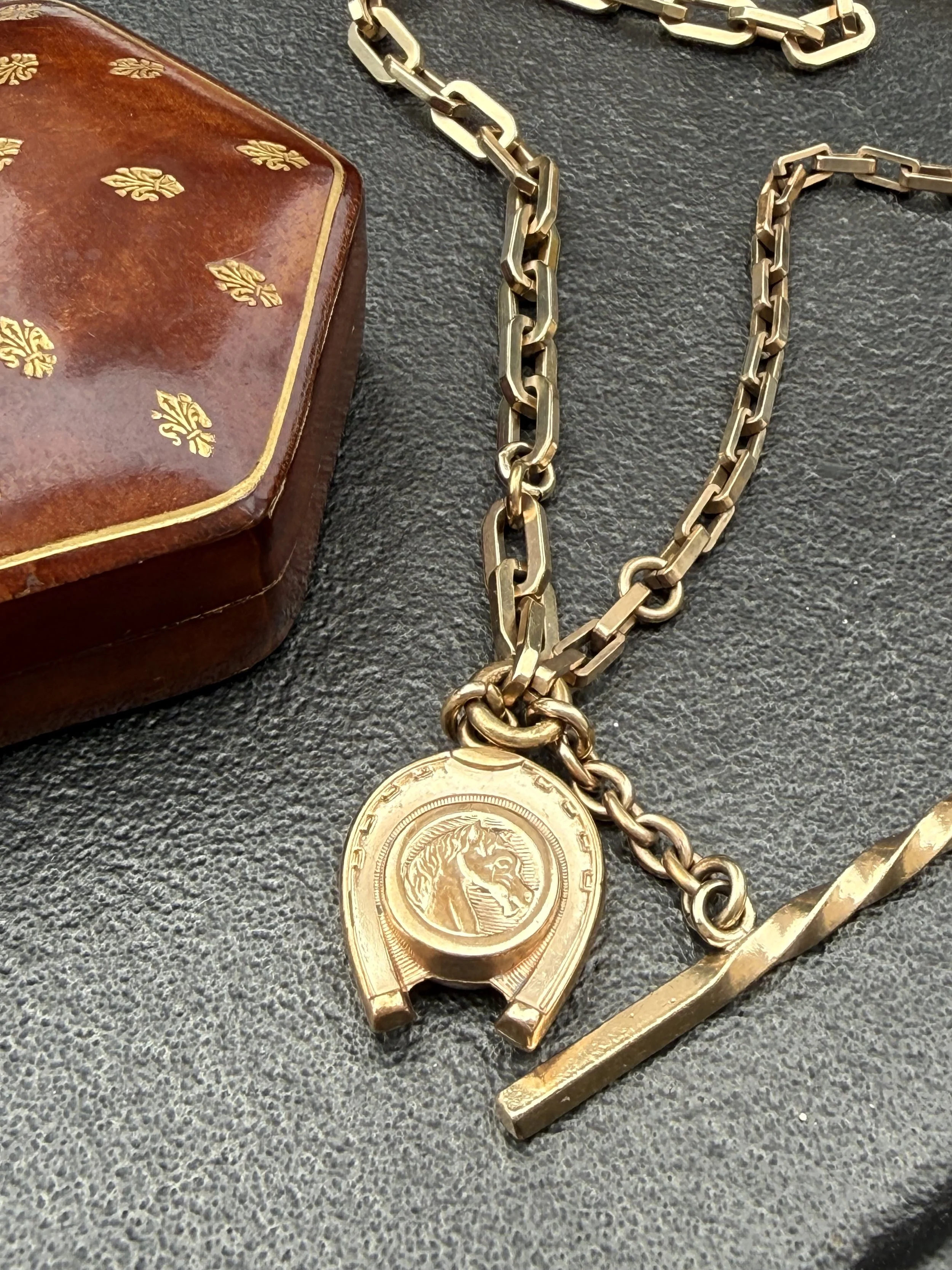 Late 19th century double sided etched horseshoe fob with chain pairing
