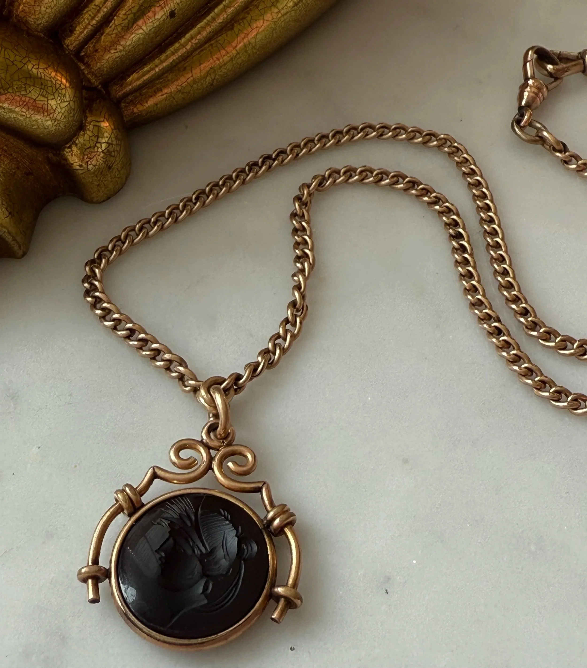 19th century carved intaglio round pendant