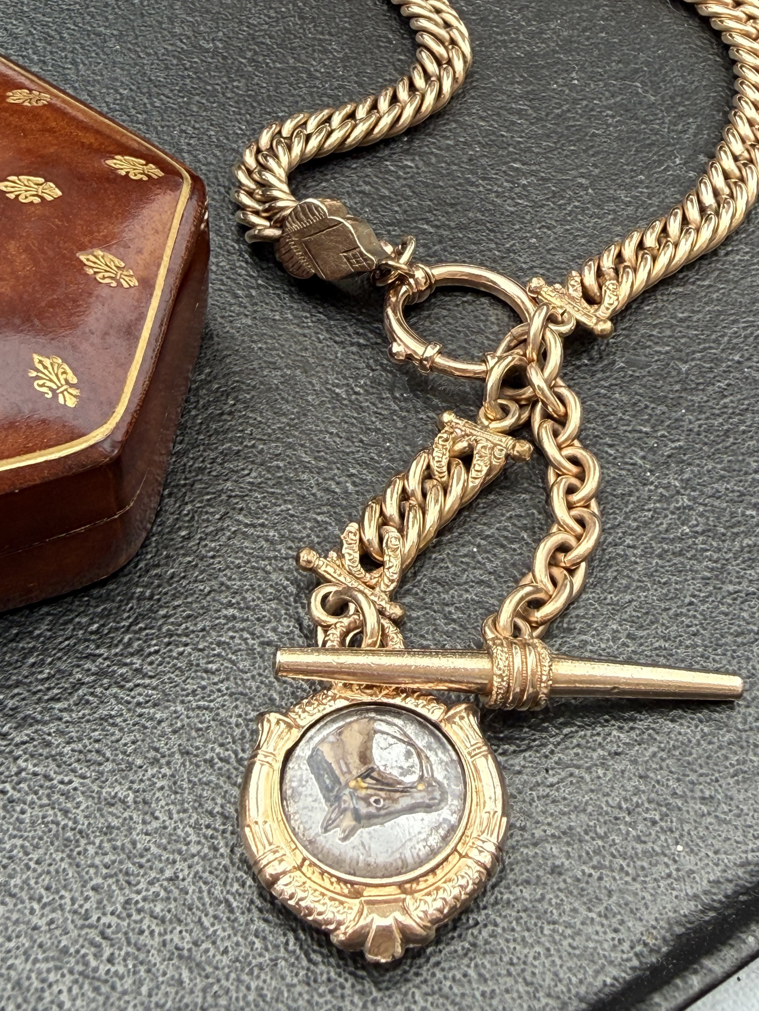 Late 19th century heavy curb chain paring with etched glass horse head fob