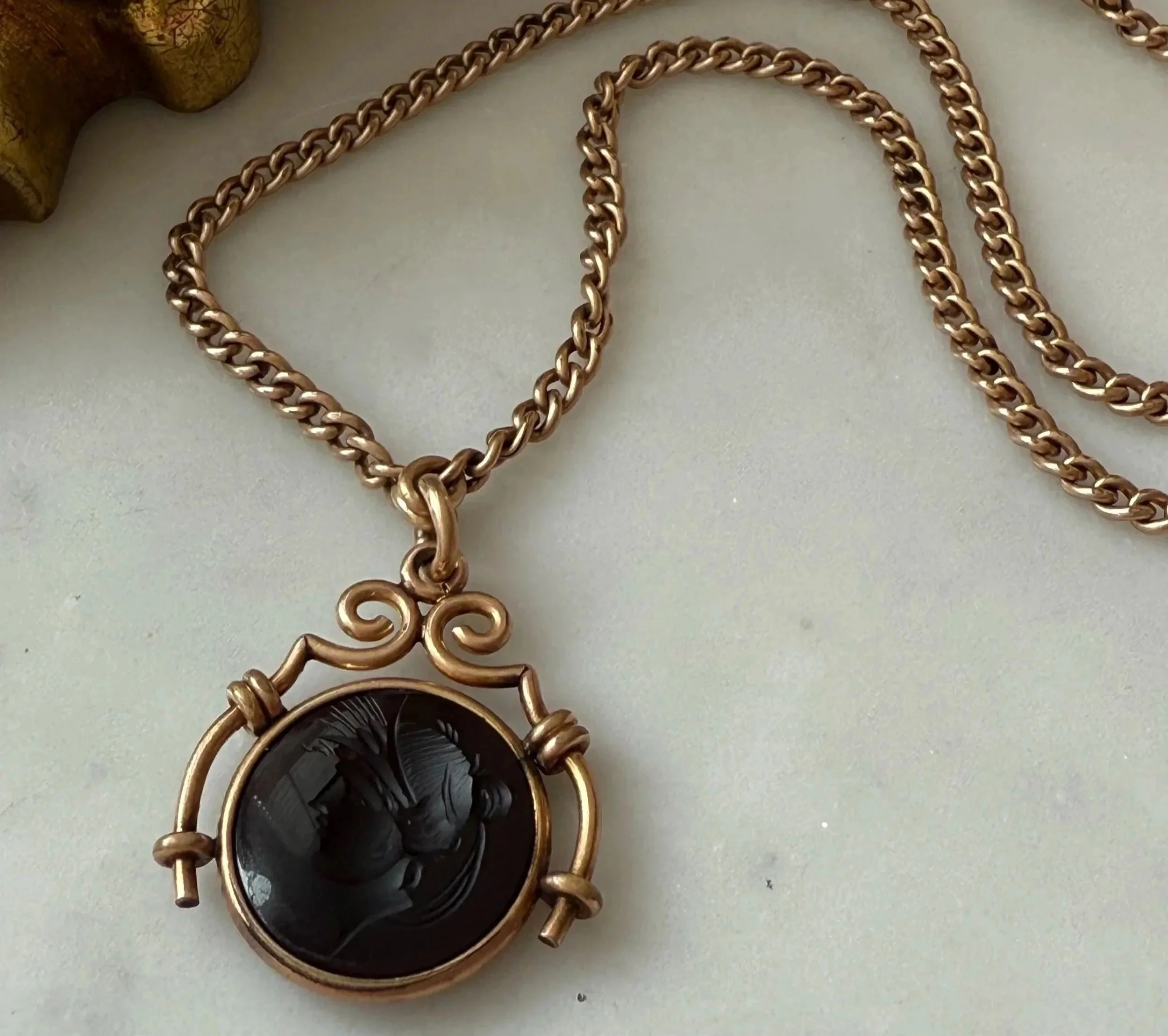 19th century carved intaglio round pendant