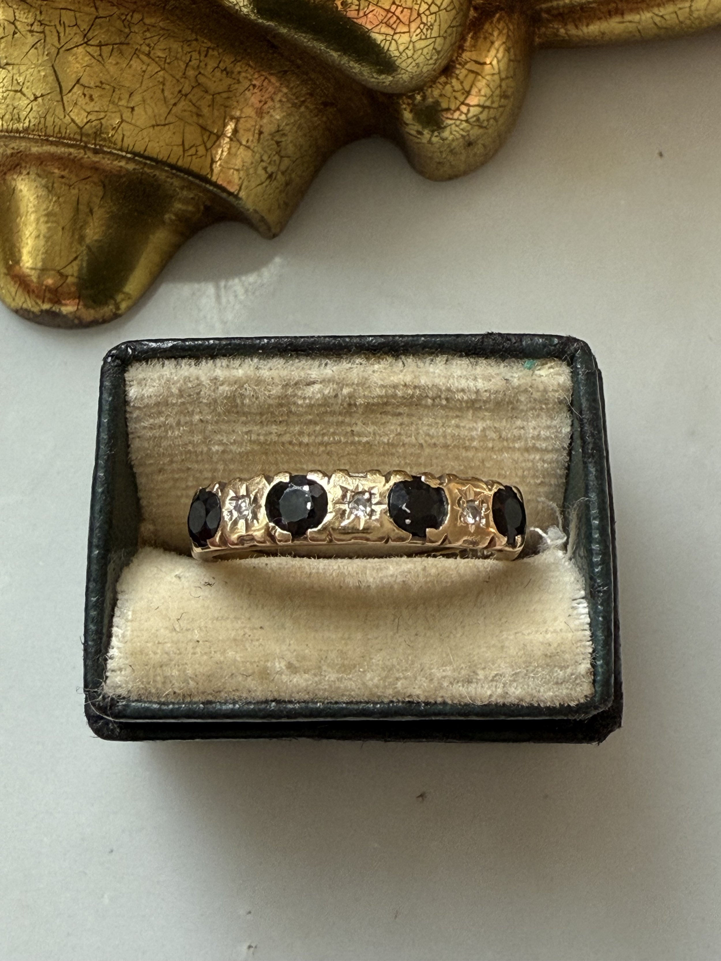 9k gold sapphire and diamond raised band