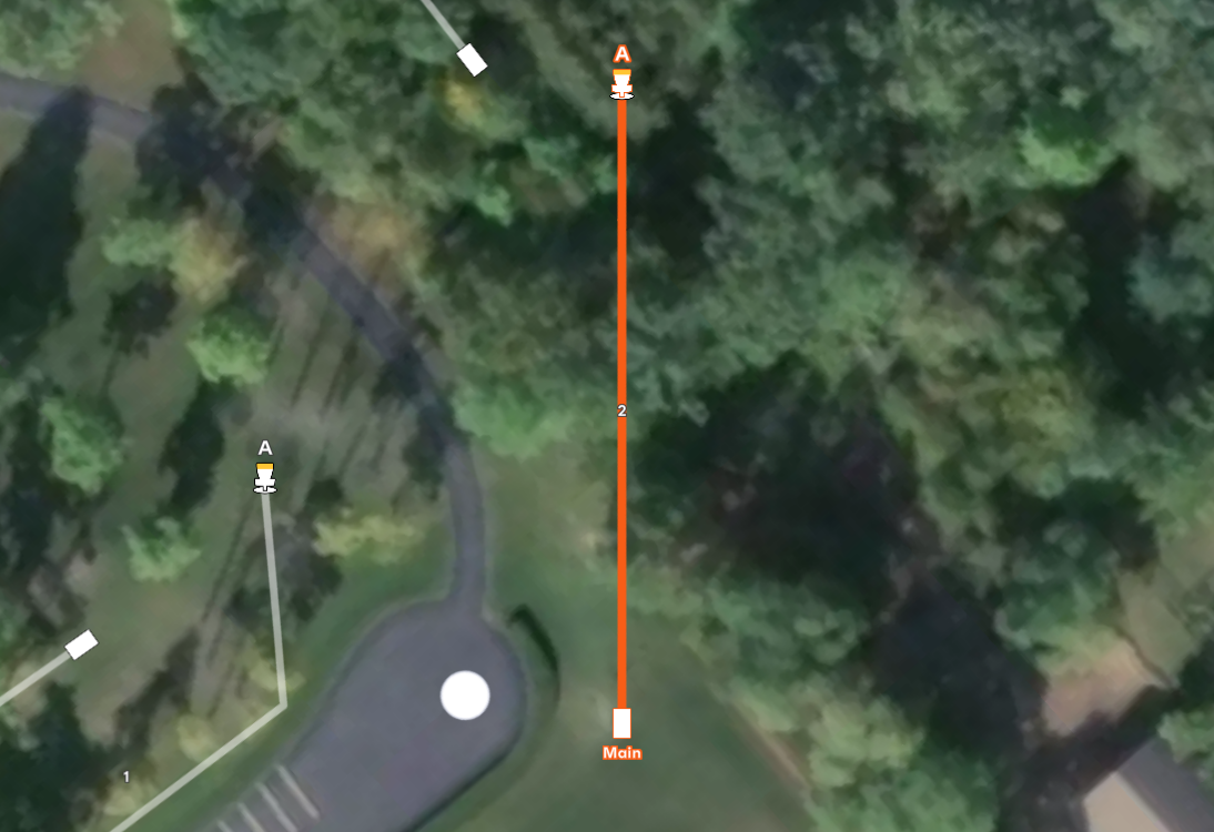 Aerial map of hole #2 at Sand Ridge Disc Golf Course. Shows a straight orange flight path from the Main tee to basket A. Woods line the right, with a paved loop and hole #1 on the left.