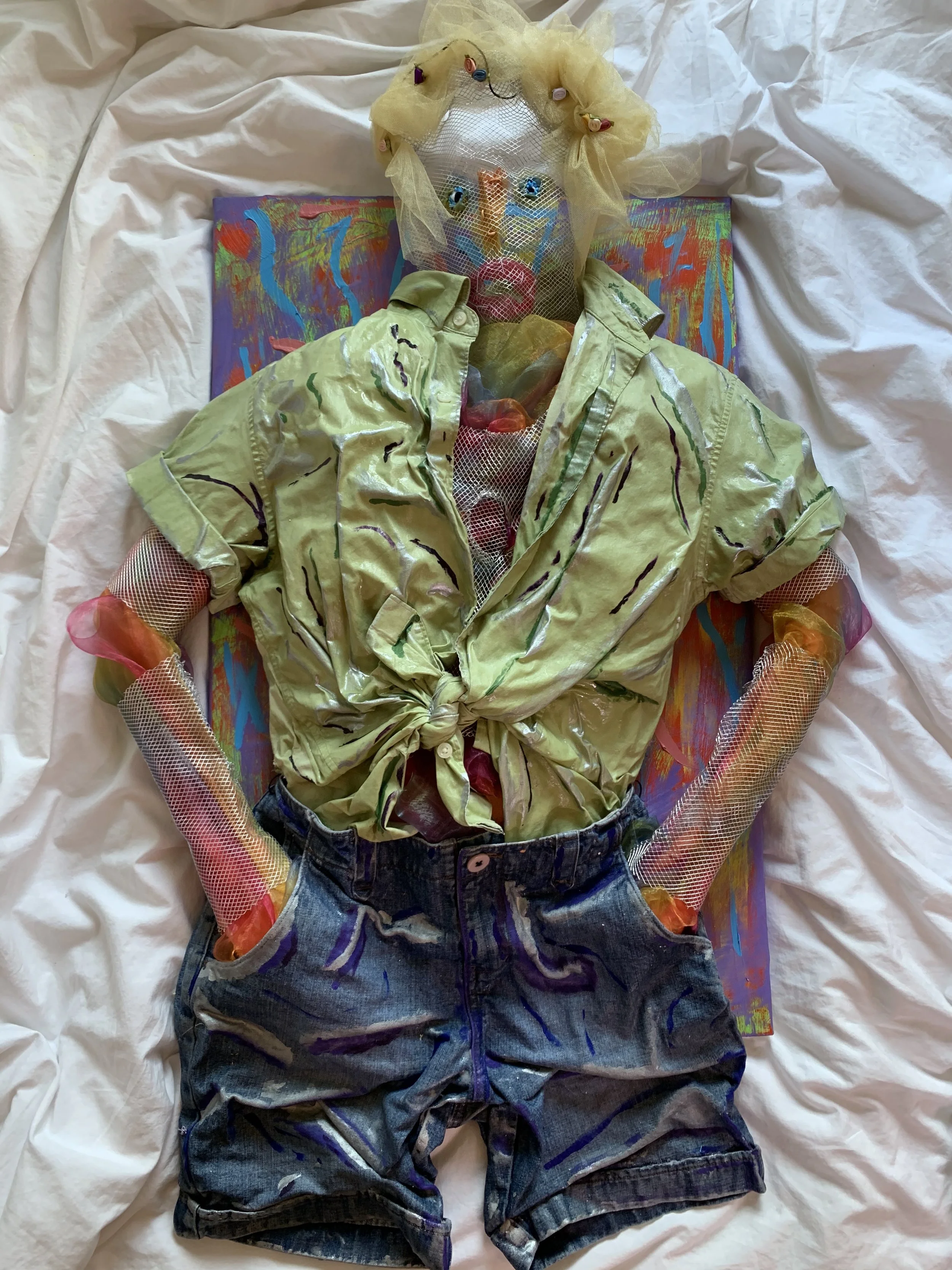 3D Self Portrait: Made by first making a mold of my body, then using wire mesh to for my arms and chest, and then using modge podge on the clothing.I then mounted to a canvas to made a 3D effect.  