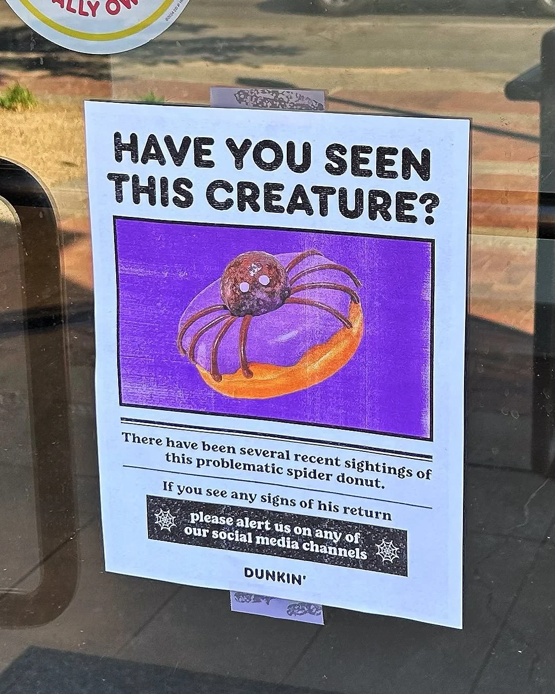 dunkin spider donut halloween campaign wanted poster