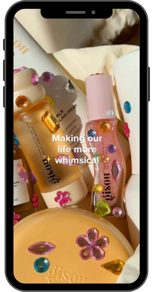 Bedazzle Everything trend - skincare product covered in rhinestones and gemstones for Instagram Reels