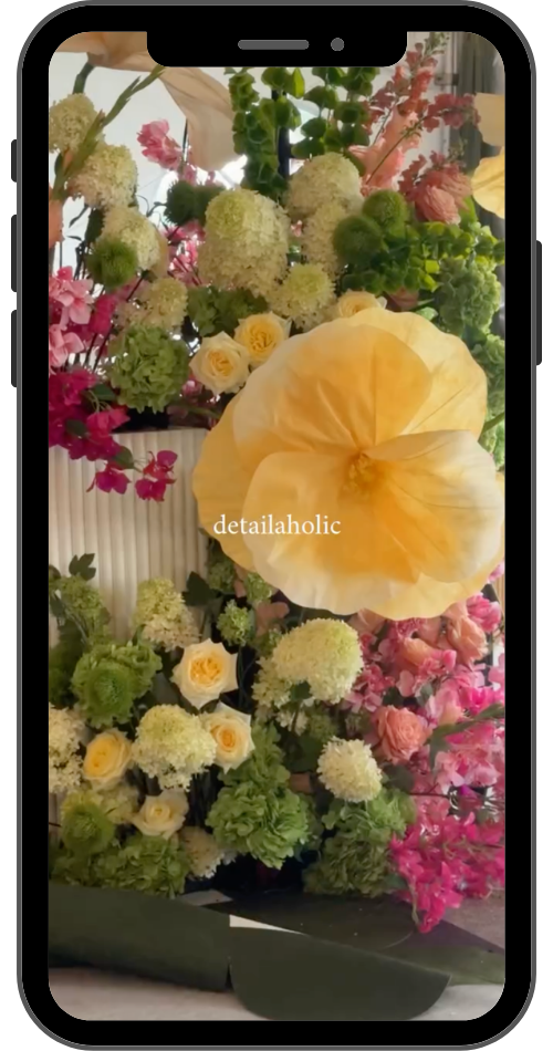 Aholic content trend - creator filming b-roll with aholic text overlay for brand identity Reels