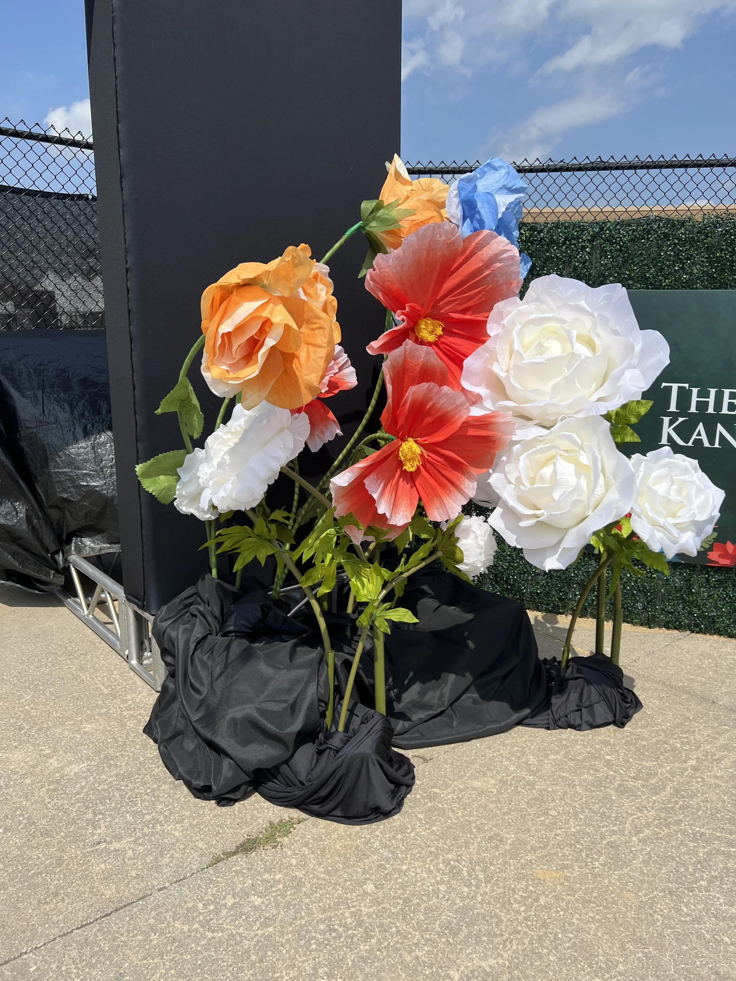 Giant Faux Flower props in a cluster