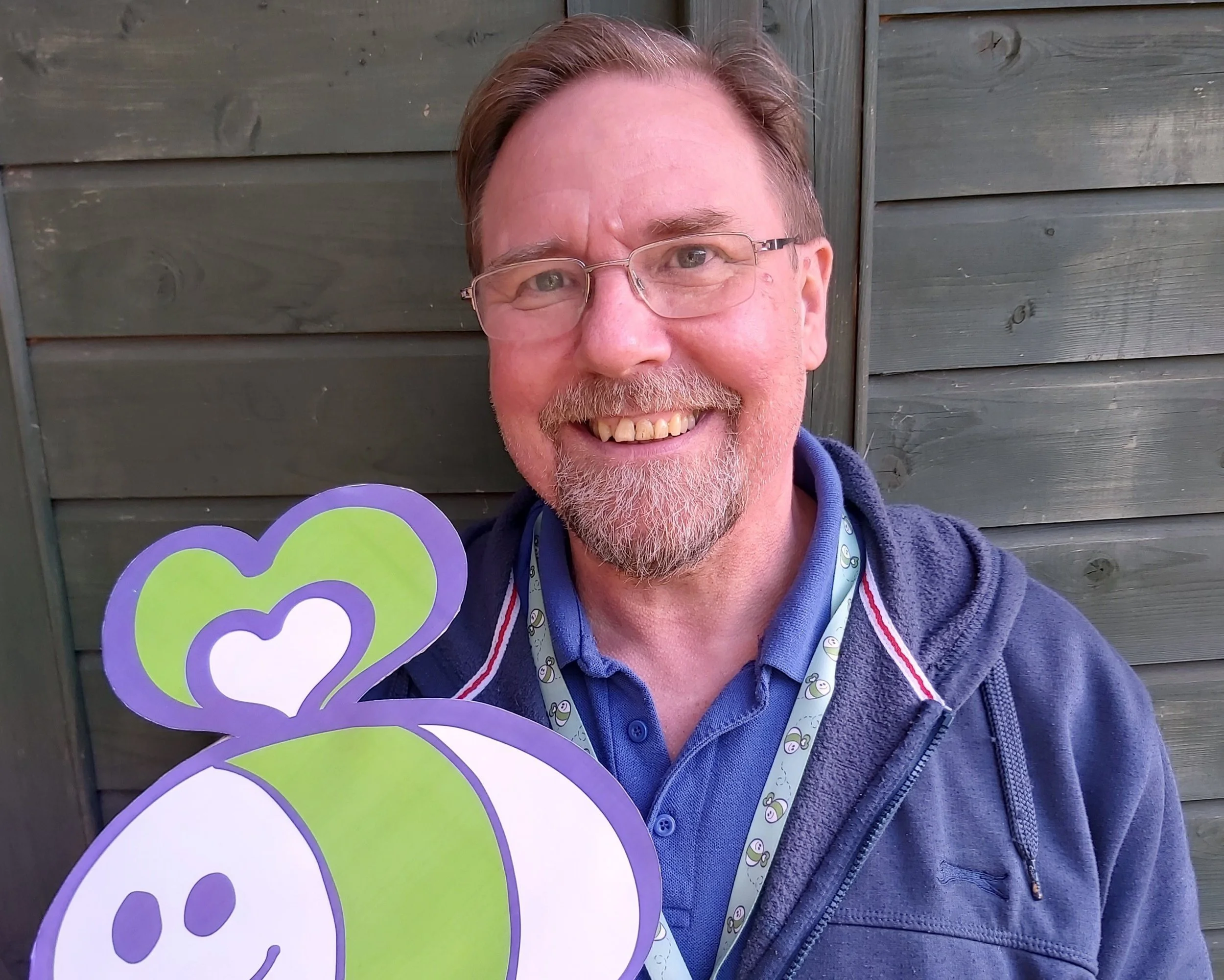 Photo of Tony with GL11 Bee Logo