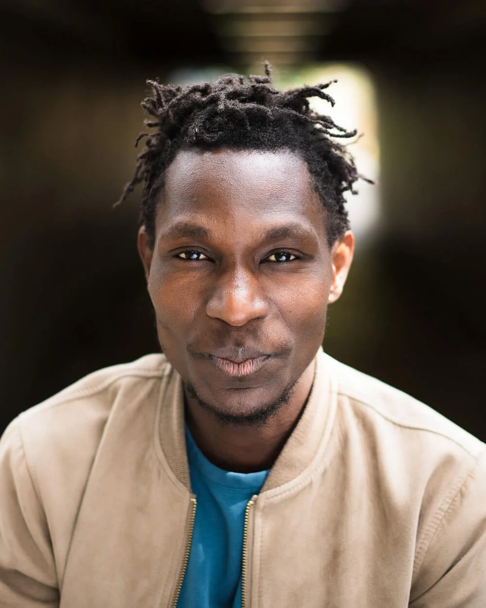 John+Rwothomack_Headshot (1).jpeg