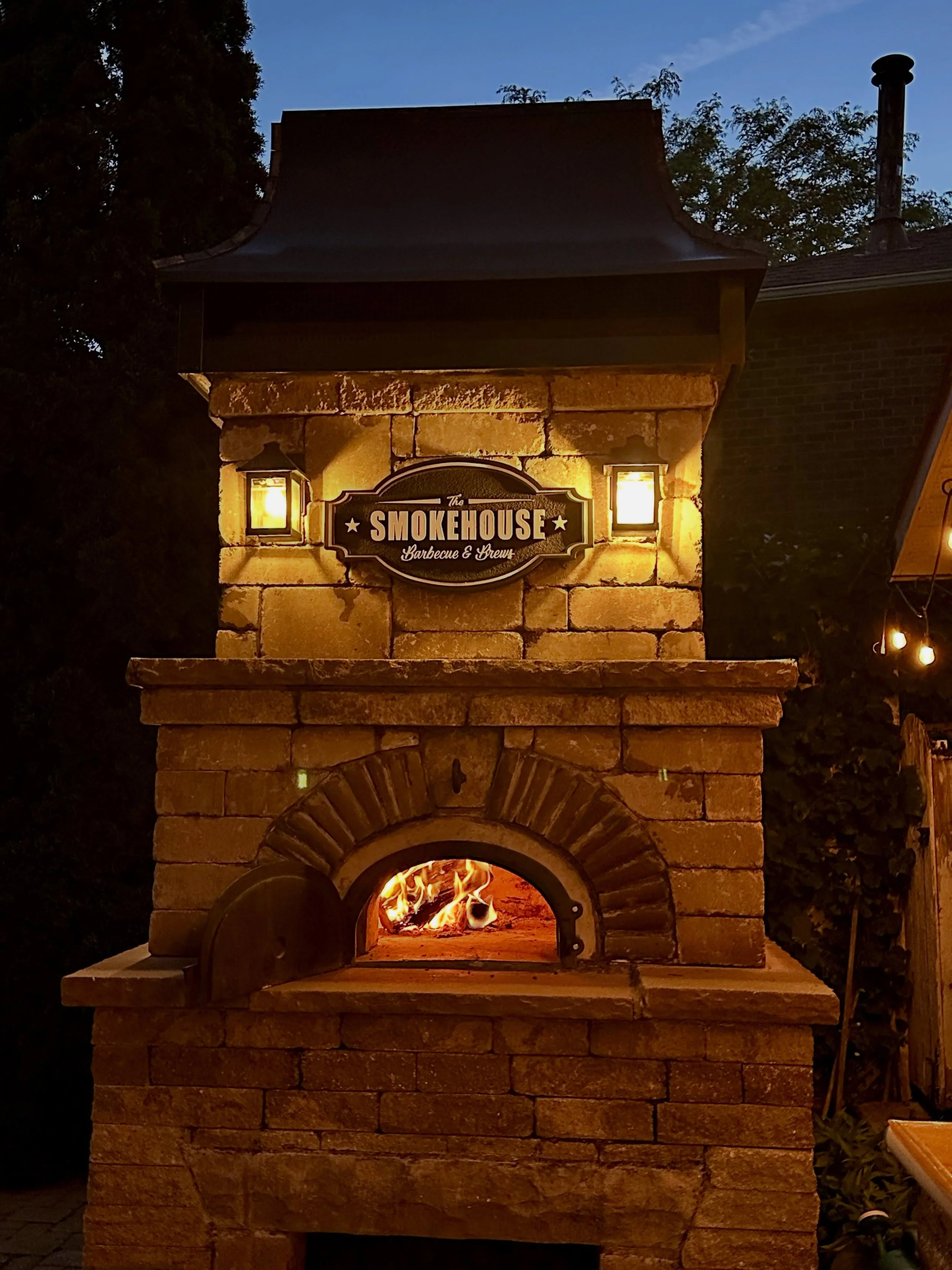 Twilight time at the Smokehouse, when the gathering takes on a whole new ambiance. Fire is the gathering unifier.

#brickoven #backyard #backyardbarbecue #pizzaoven #thesmokehouse