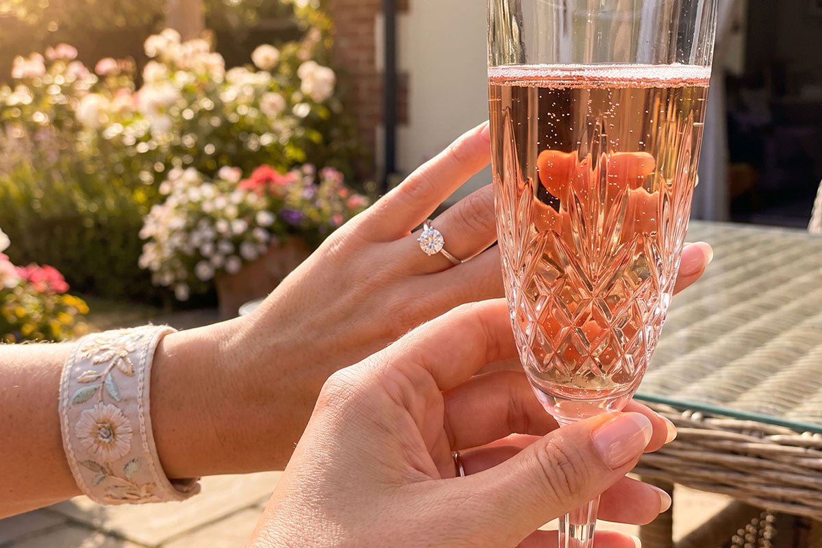 Engagement ring and sparkling wine. Mike Belobradic.