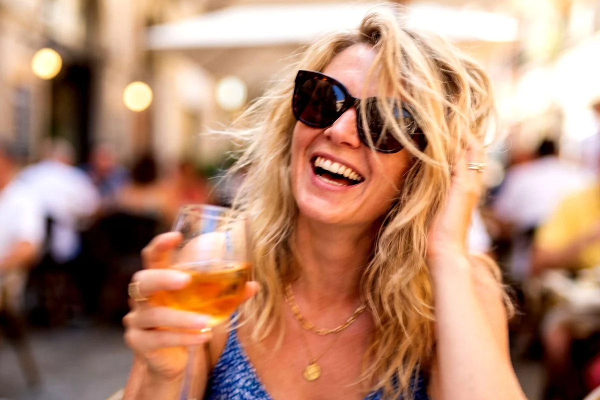 Social media photo of a female wine drinker. Mike Belobradic.