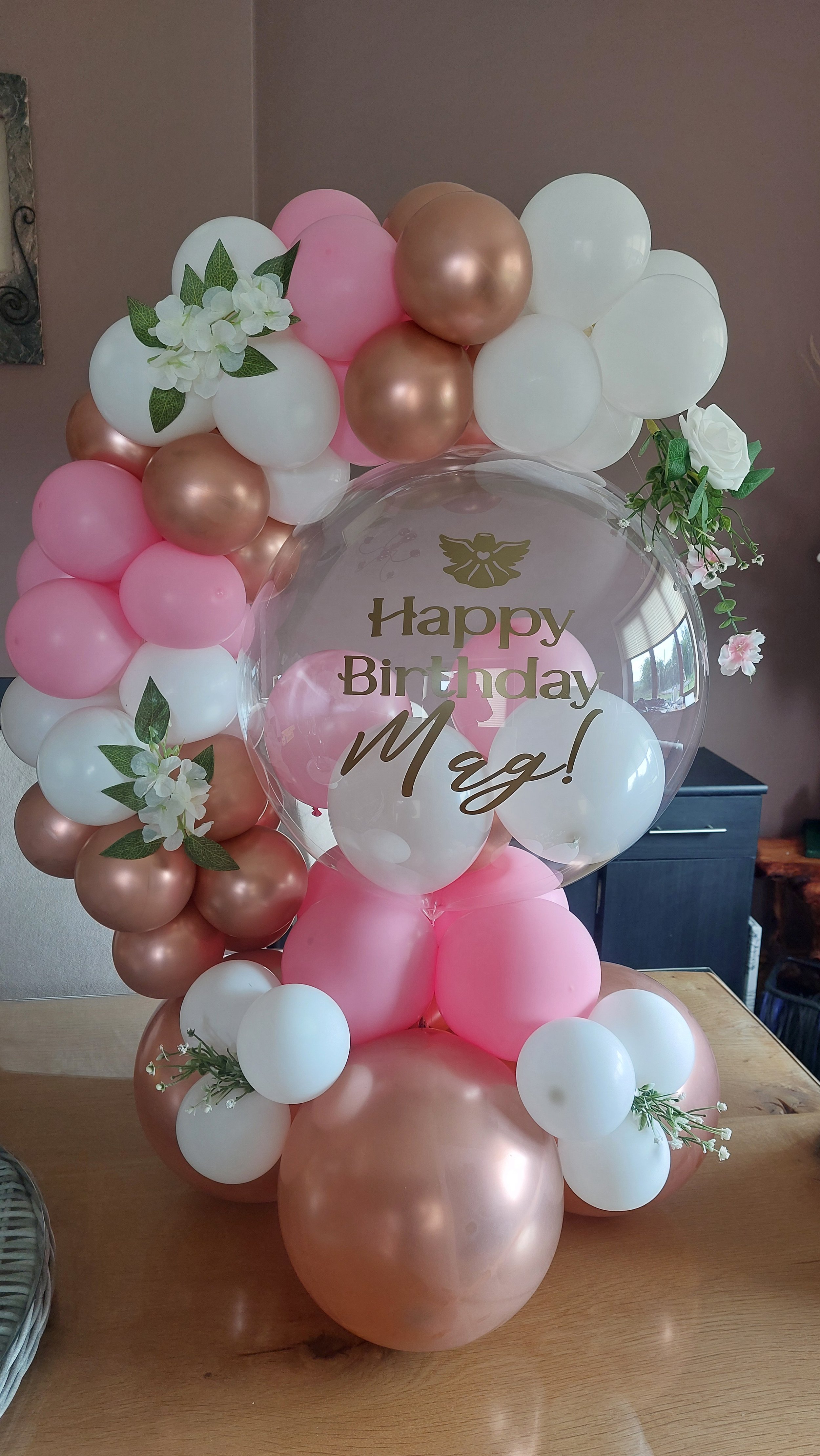 ITEM #179 --- Balloon hug with flowers.