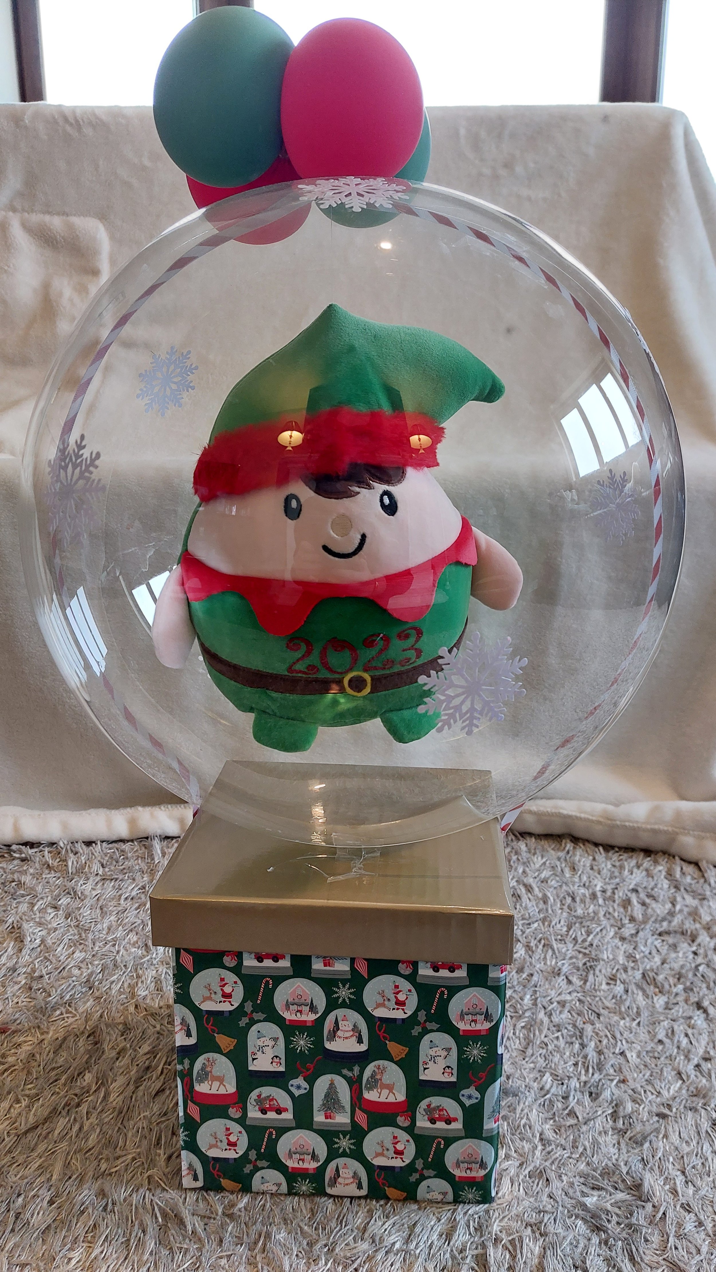 ITEM #25
€20
Elf teddy inside a bubble balloon box.
