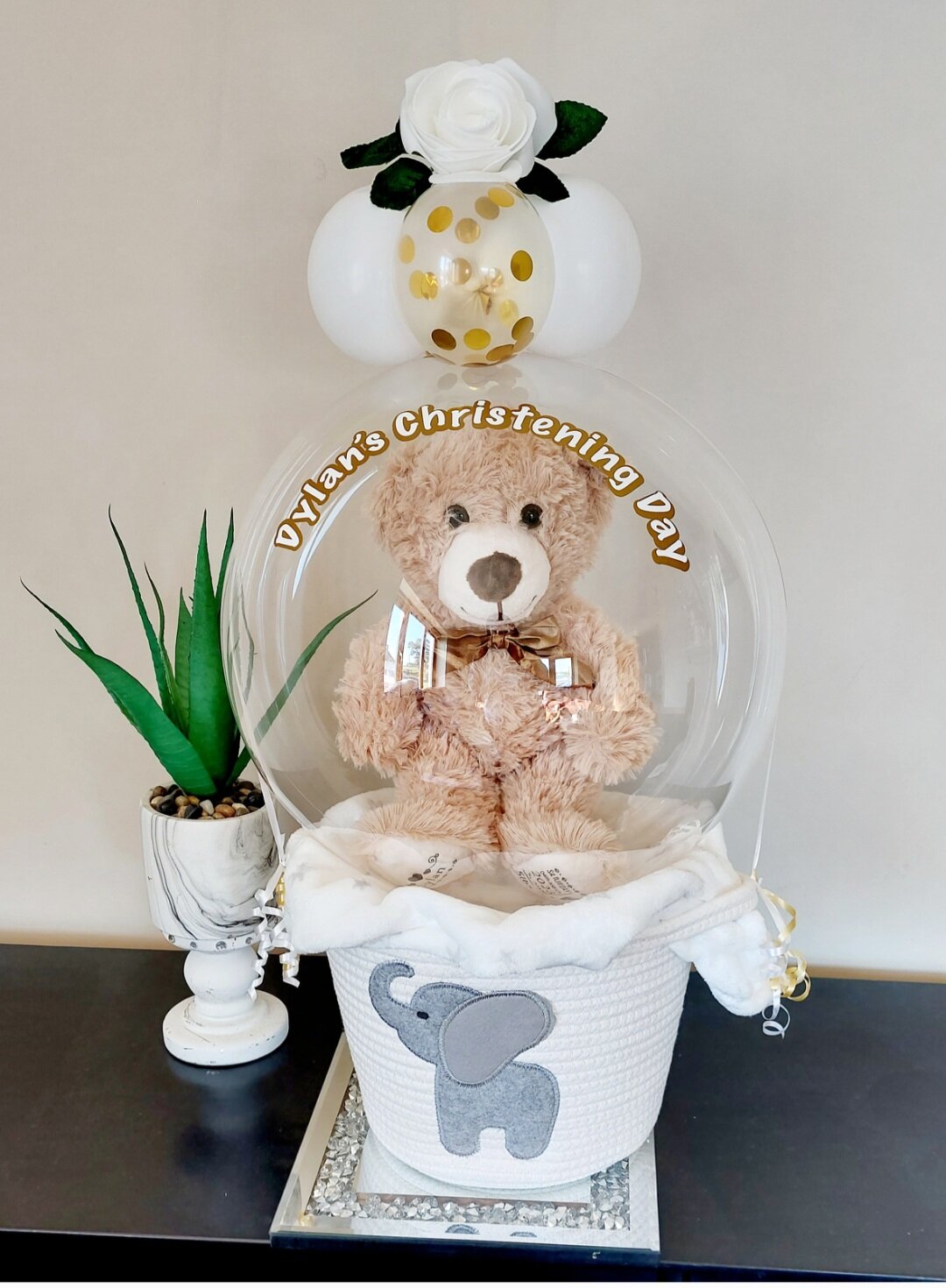 ITEM #24
€55
Personalised bubble balloon basket with personalised teddy, baby fleece blanket, mini balloons and roses.