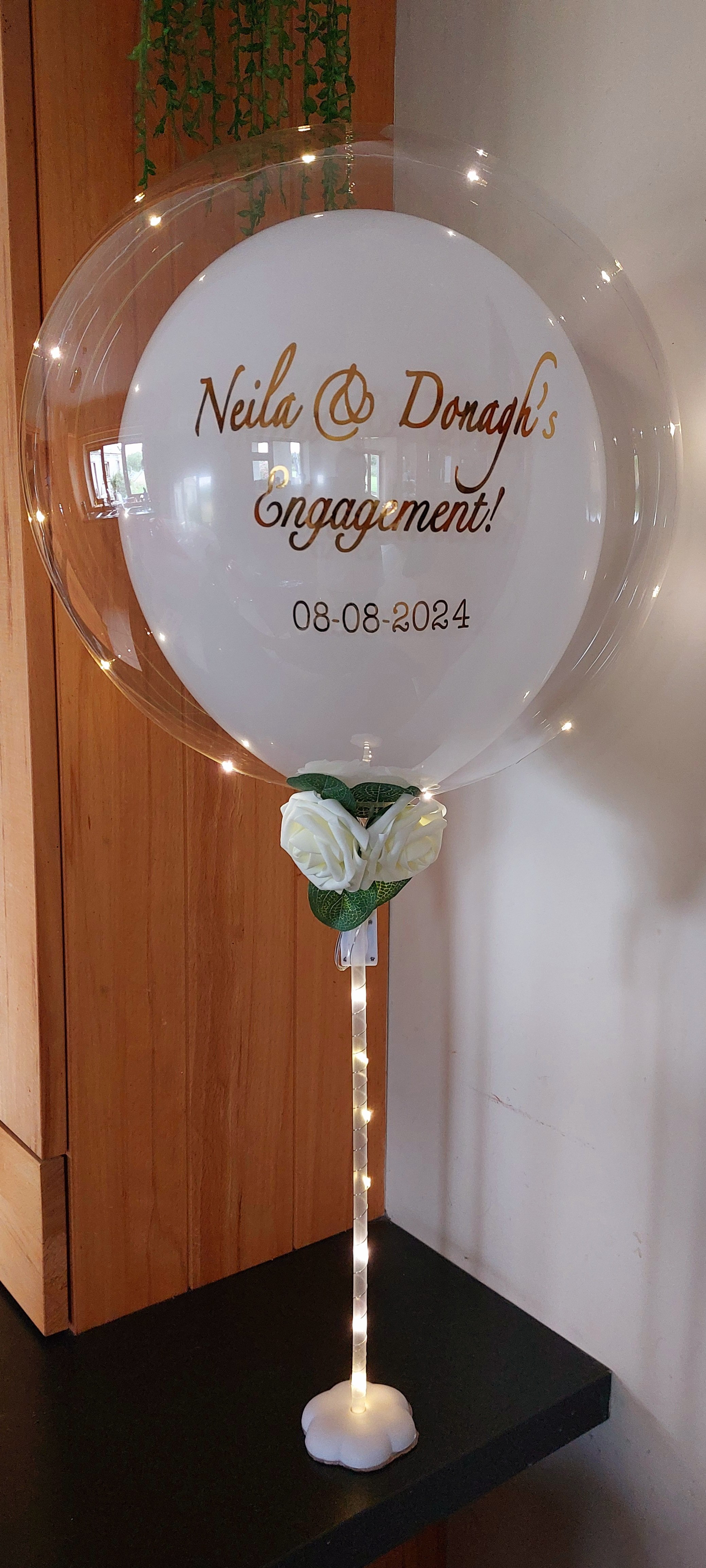 ITEM #7
€28
Personalised Engagement light up balloon with white roses.