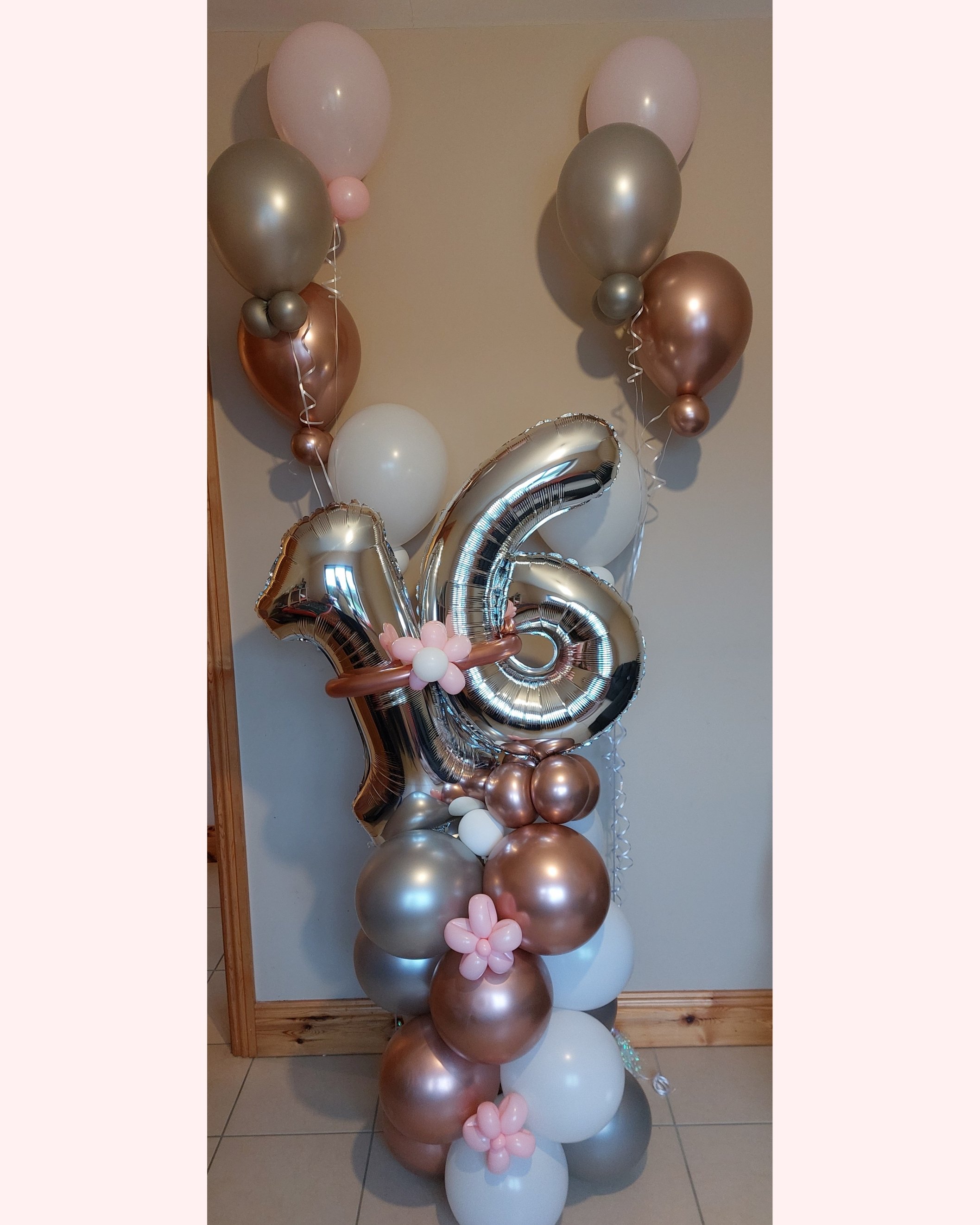 ITEM #66
€75
Large 16th birthday balloon display with helium filled balloon bouquets.