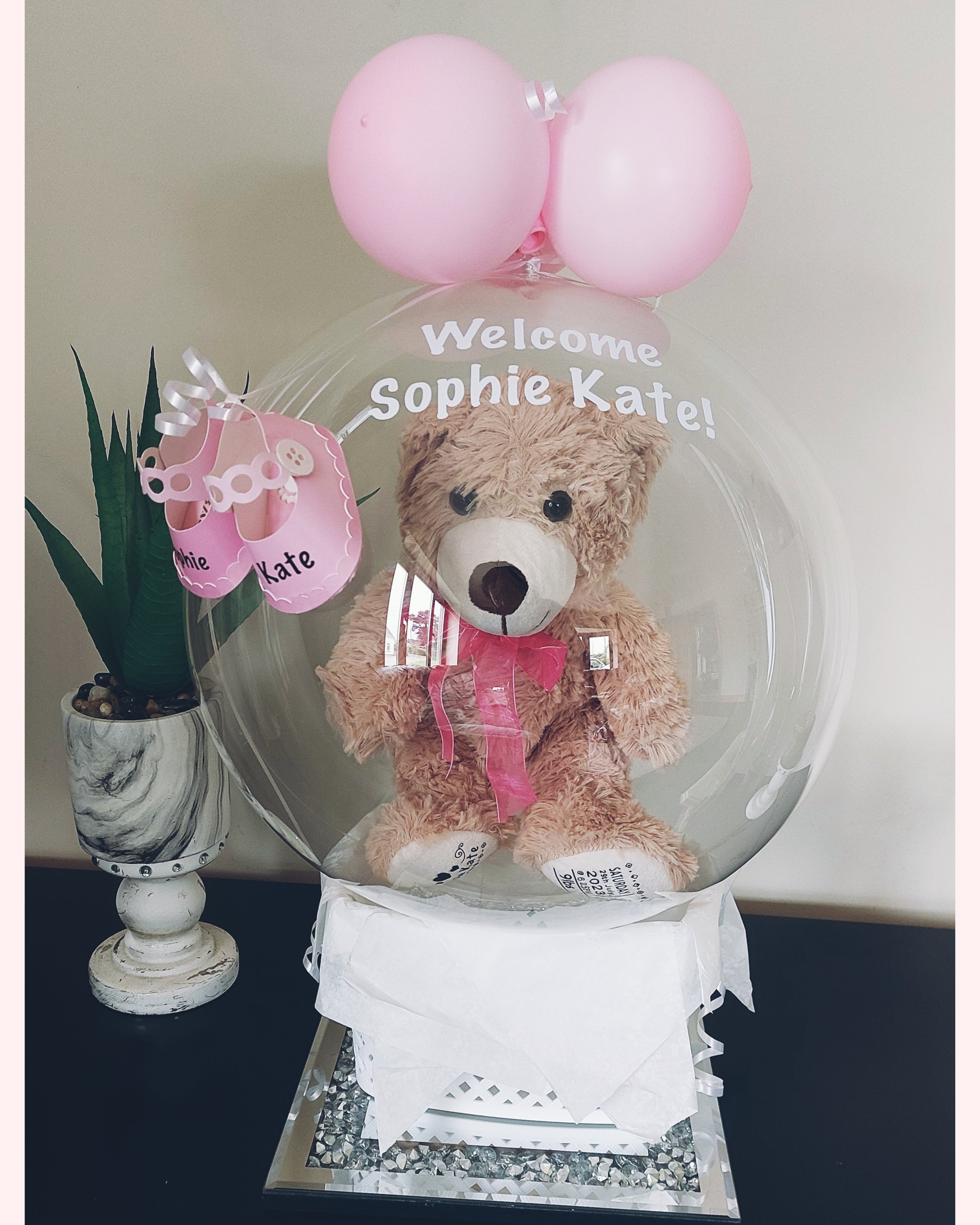 ITEM #23
€45
Personalised bubble balloon basket with personalised teddy, mini shoes and mini shoes.
