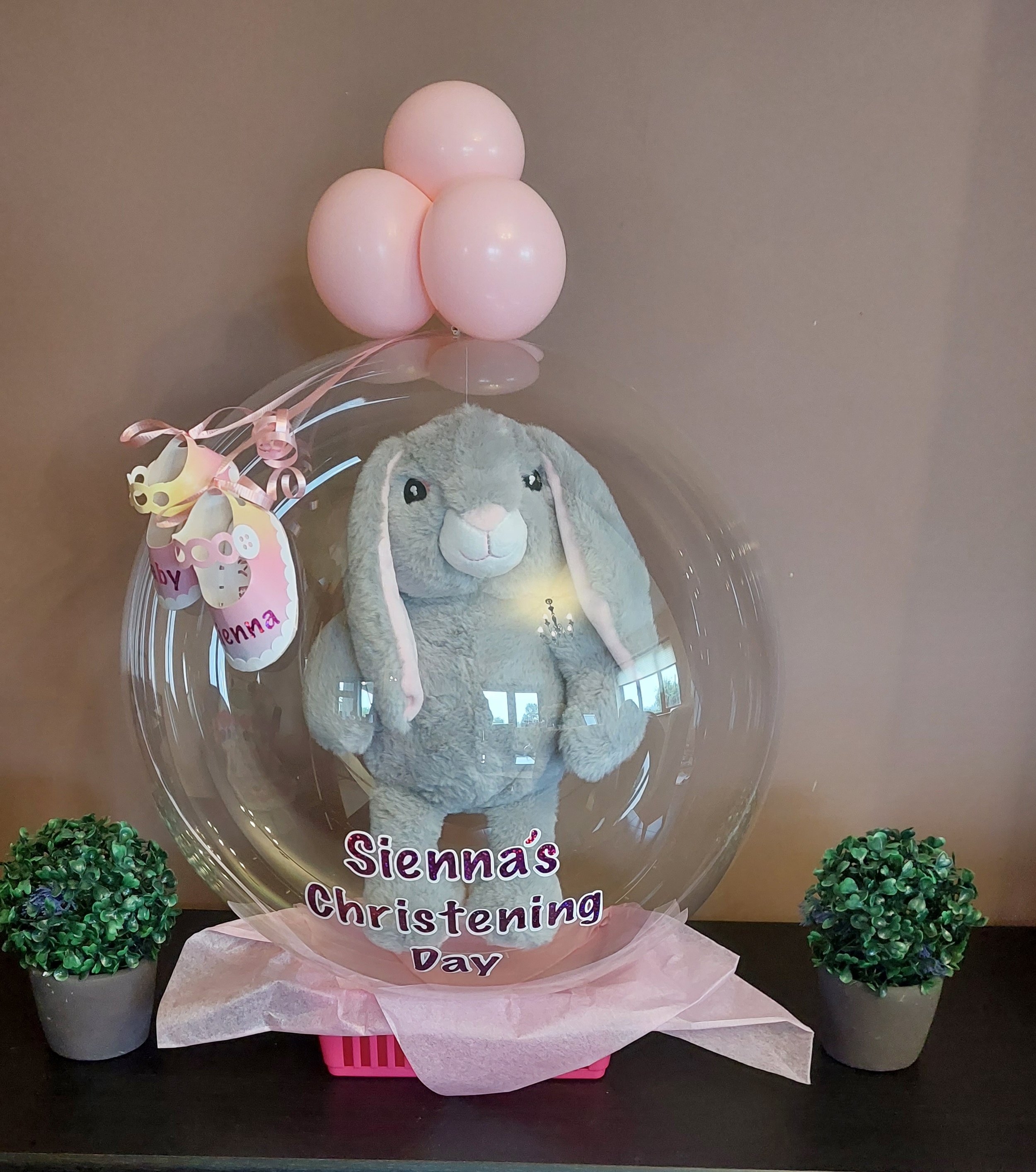 ITEM #29
€45
Personalised Christening bubble balloon basket with personalised bunny teddy and mini shoes.