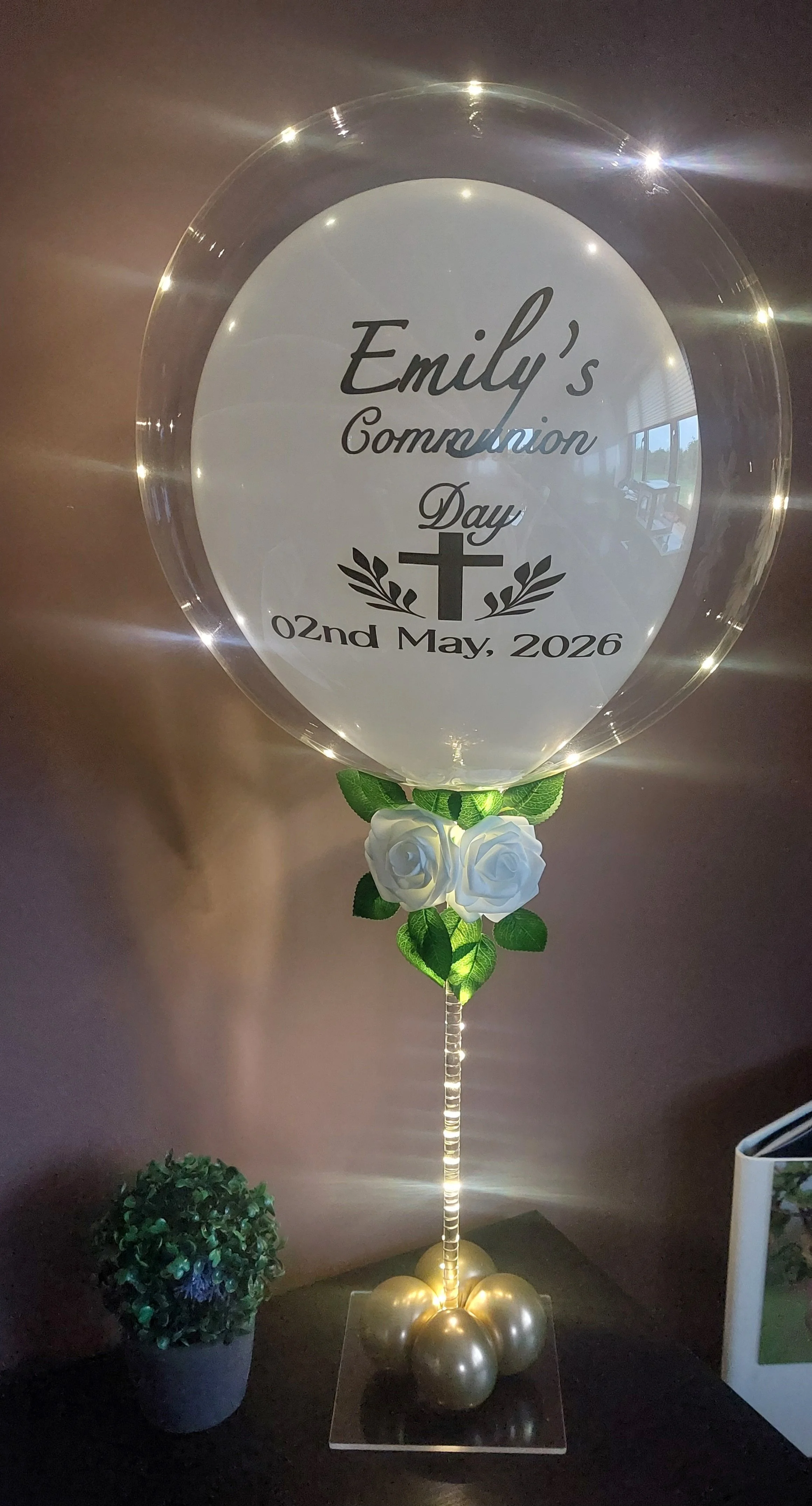 ITEM #105 --- Light up bubble balloon with inner white balloon with roses.