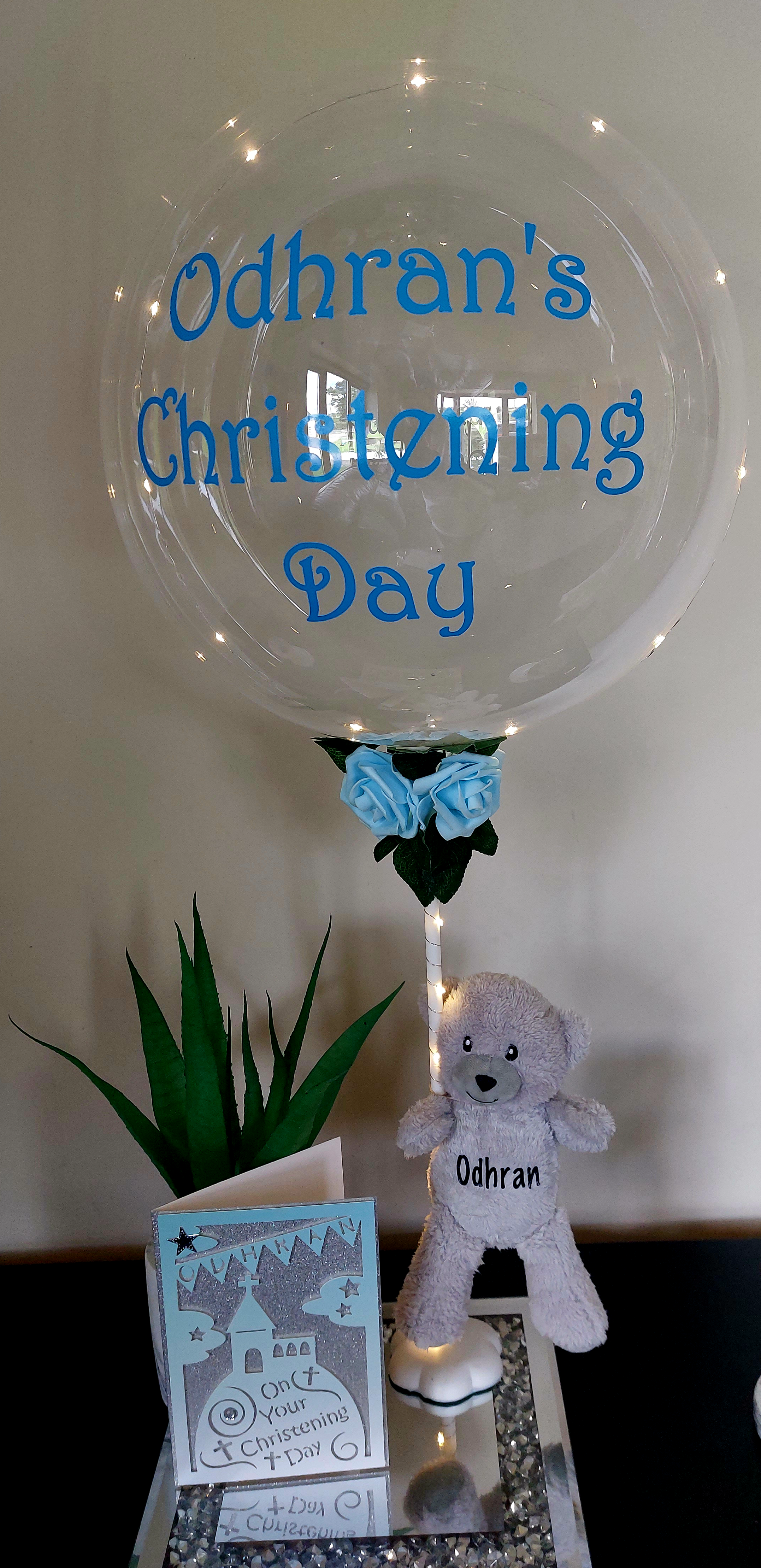 ITEM #55
€8.50 for card €32 for balloon
Personalised light up bubble balloon with blue roses and a teddy. And a Personalised Christening card (Blue).