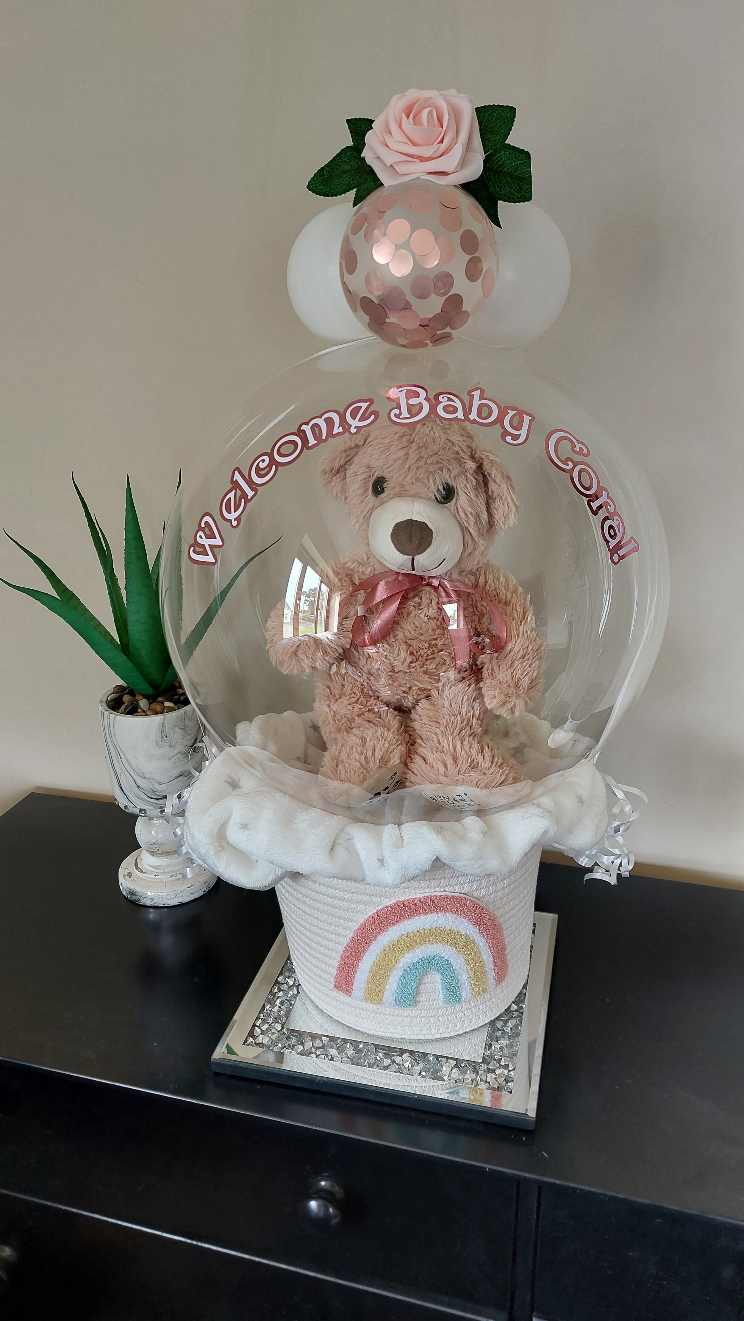 ITEM #25
€55
Personalised bubble balloon basket with personalised teddy, baby fleece blanket, mini balloons and roses.