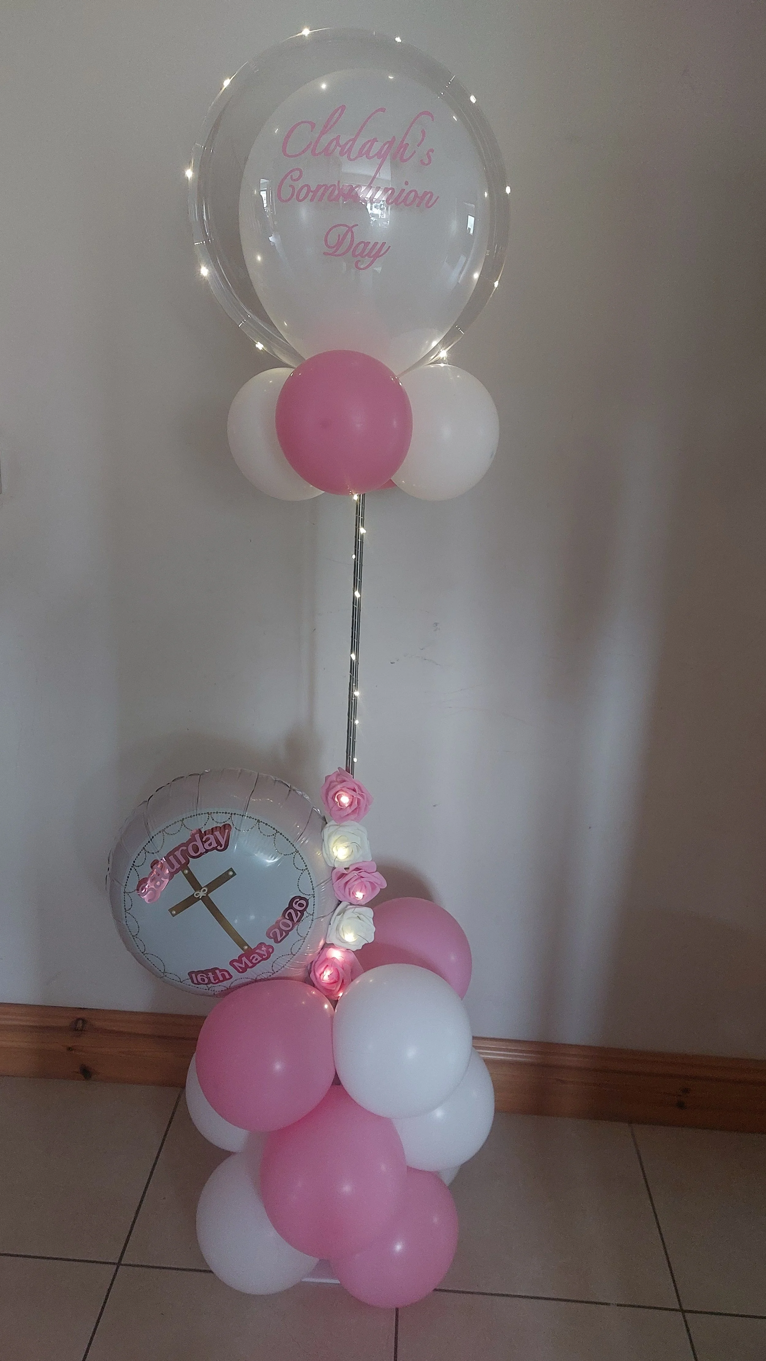 ITEM #96 --- Large light up balloon display with cross foil balloon.