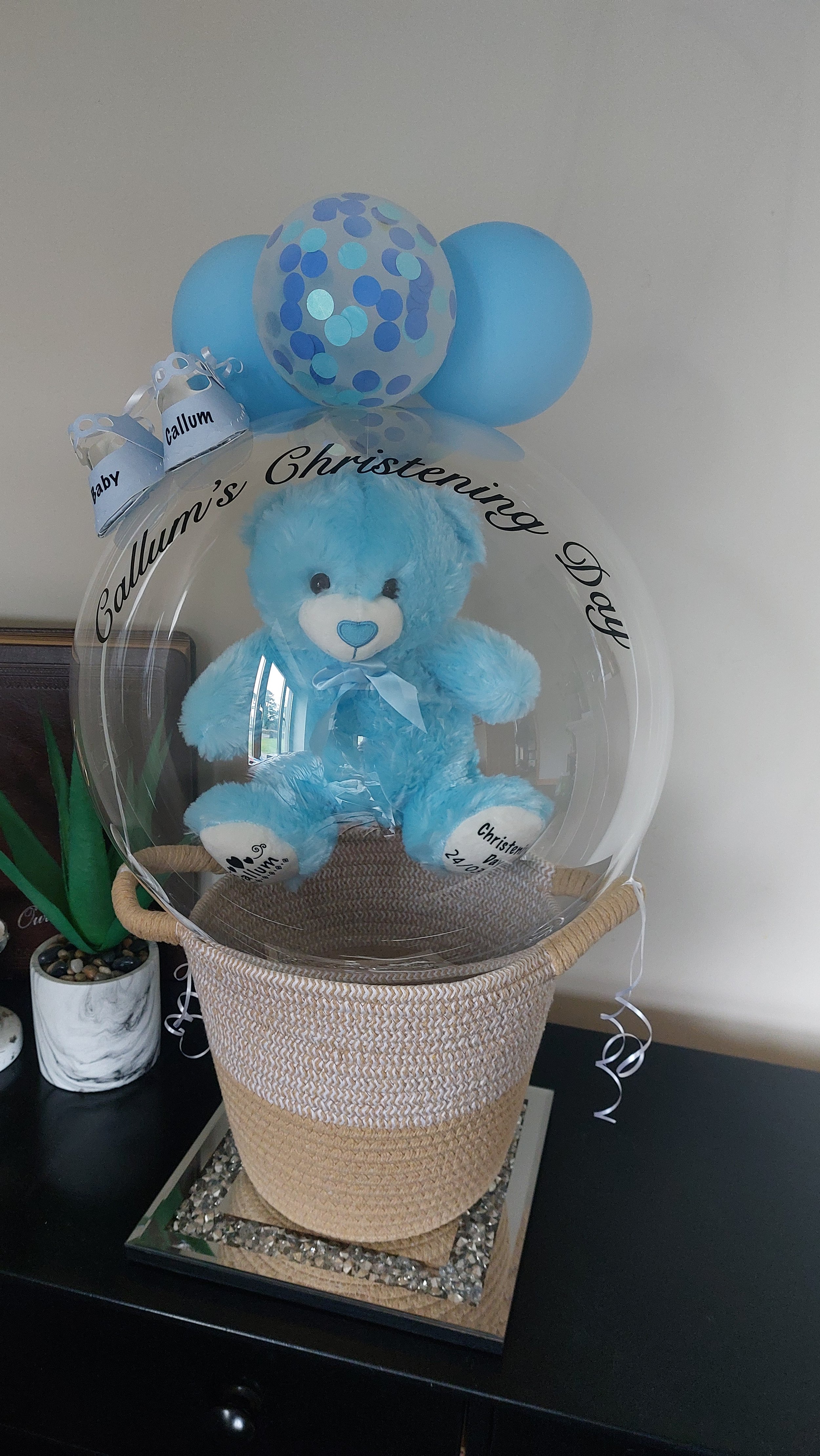 ITEM #10
€45
Personalised Christening bubble balloon basket with personalised teddy, mini balloons and mini shoes.
