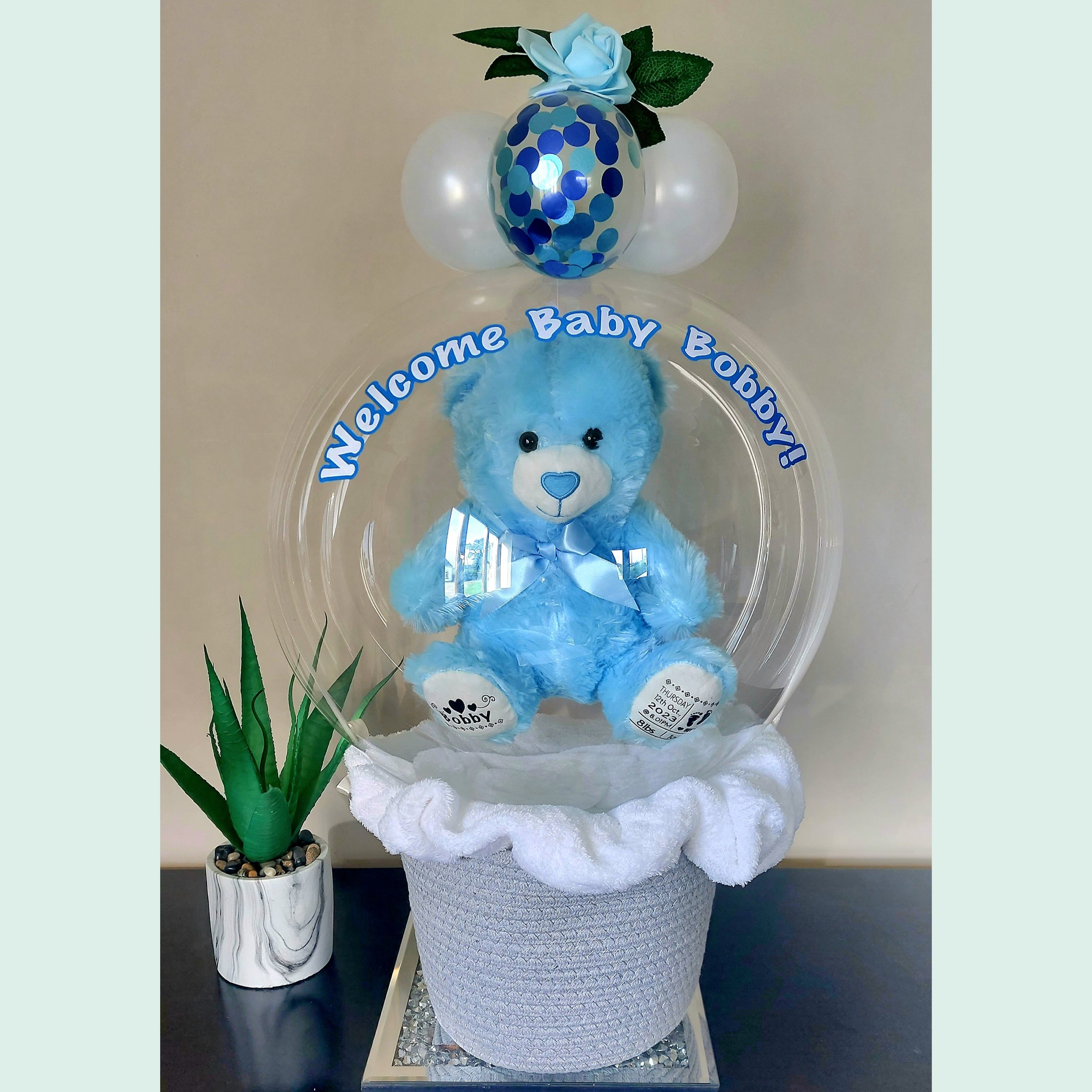 ITEM #6
€55
Personalised bubble balloon basket with personalised teddy, mini balloons and roses and baby blanket. (Blue).