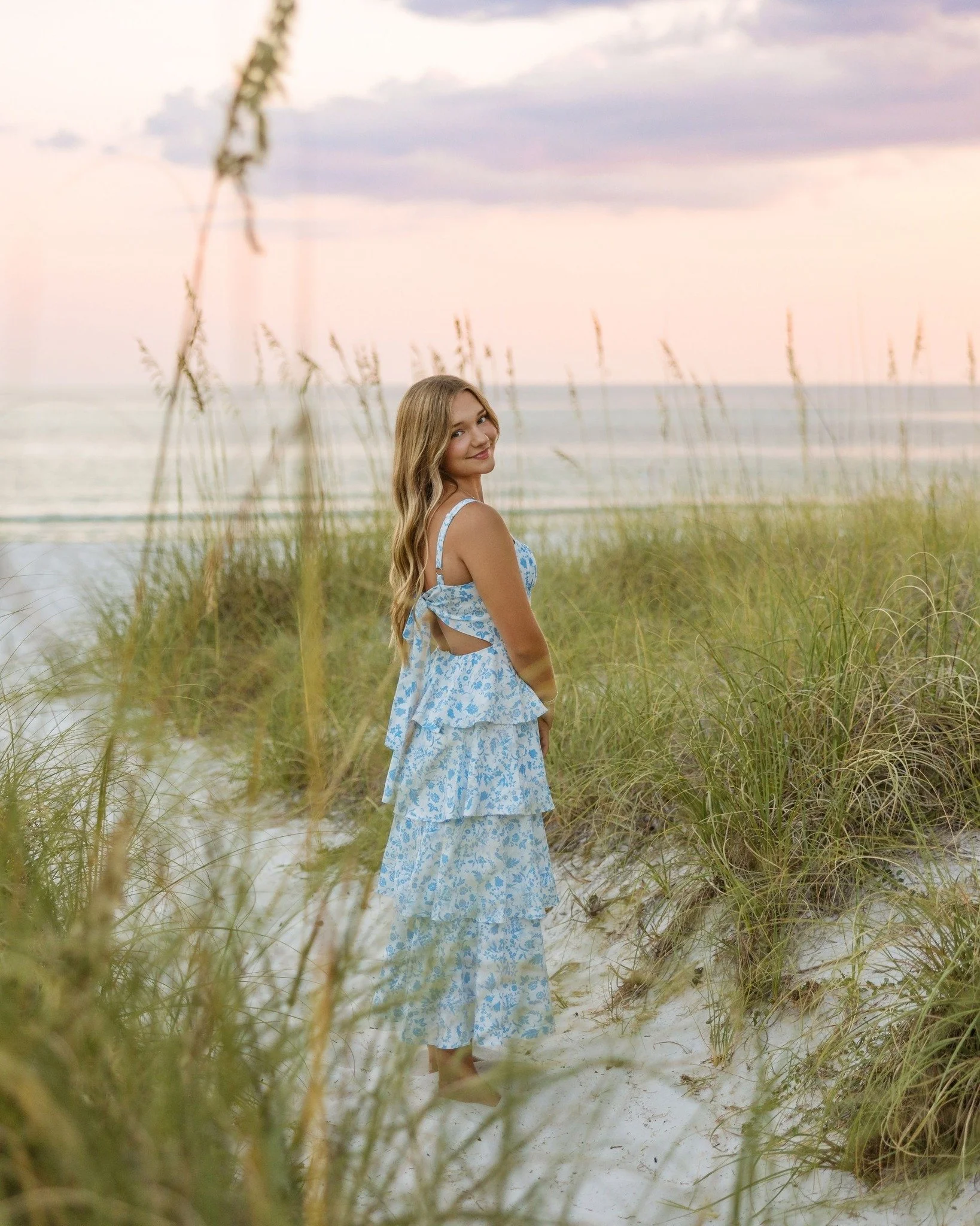 White sand or iconic backdrops? Why not both. ✨ 

Senior sessions let you switch up looks and capture the best of your style, from the beach to your favorite spots around 30A. 

After photographing Claire's older sister for her senior portraits a few