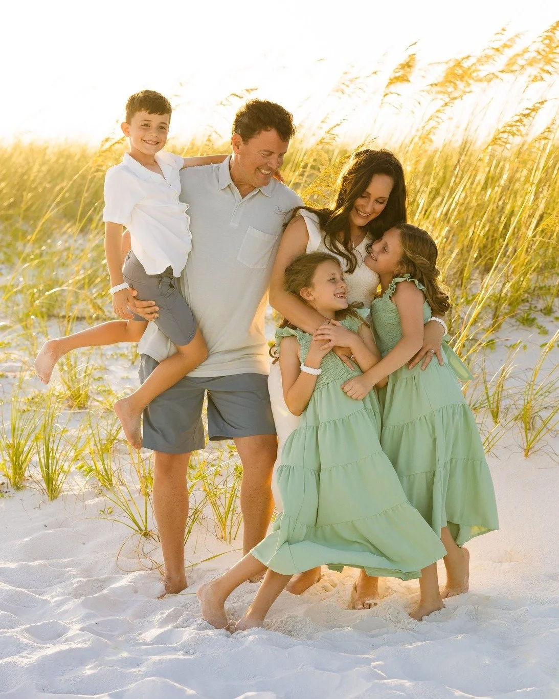 Family Portraits in the exact same beach location they got married at 10 years ago ✨ Three beautiful kids later and they built a life they are proud of. A full circle moment for sure. I love the photos they chose to frame for the wall in their entryw