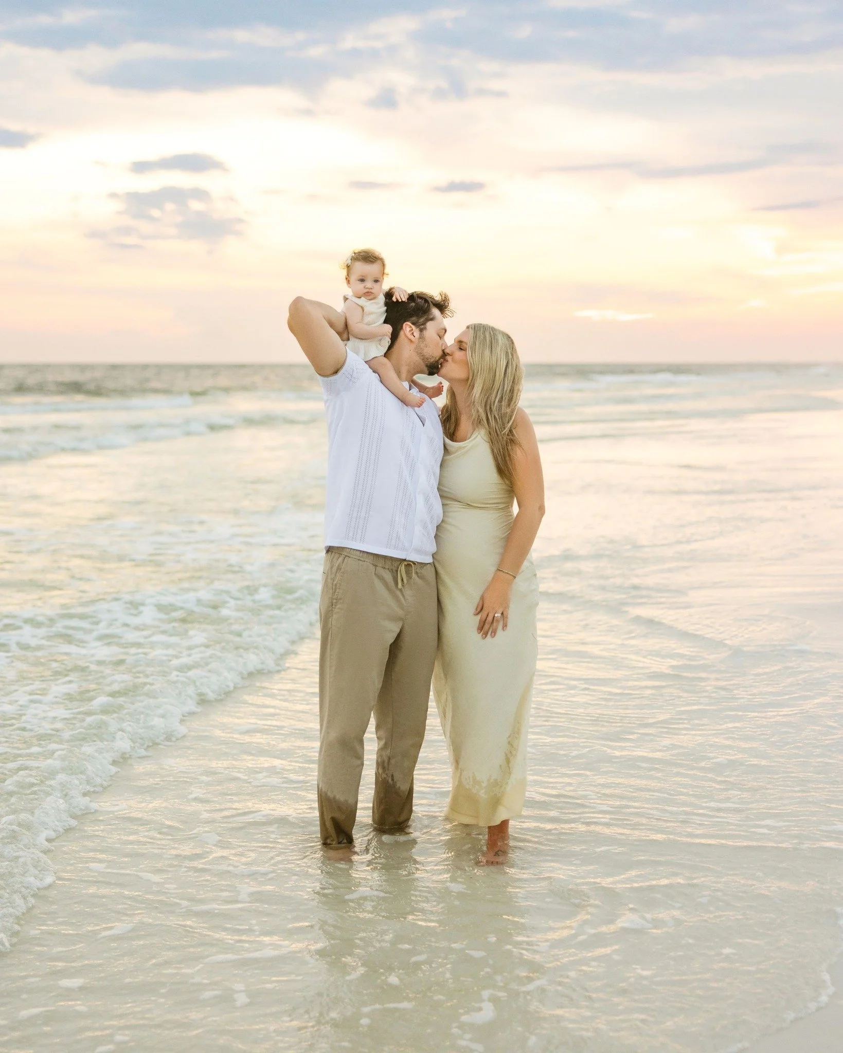 Babygirl's first family photos!!! Such a joy to photograph their family on Seacrest Beach!