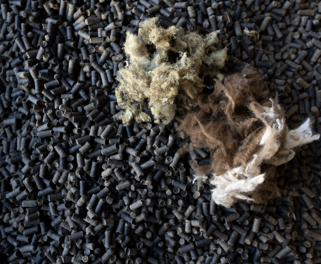 Turning California's alpaca and sheep wool to fertilizing pellets.