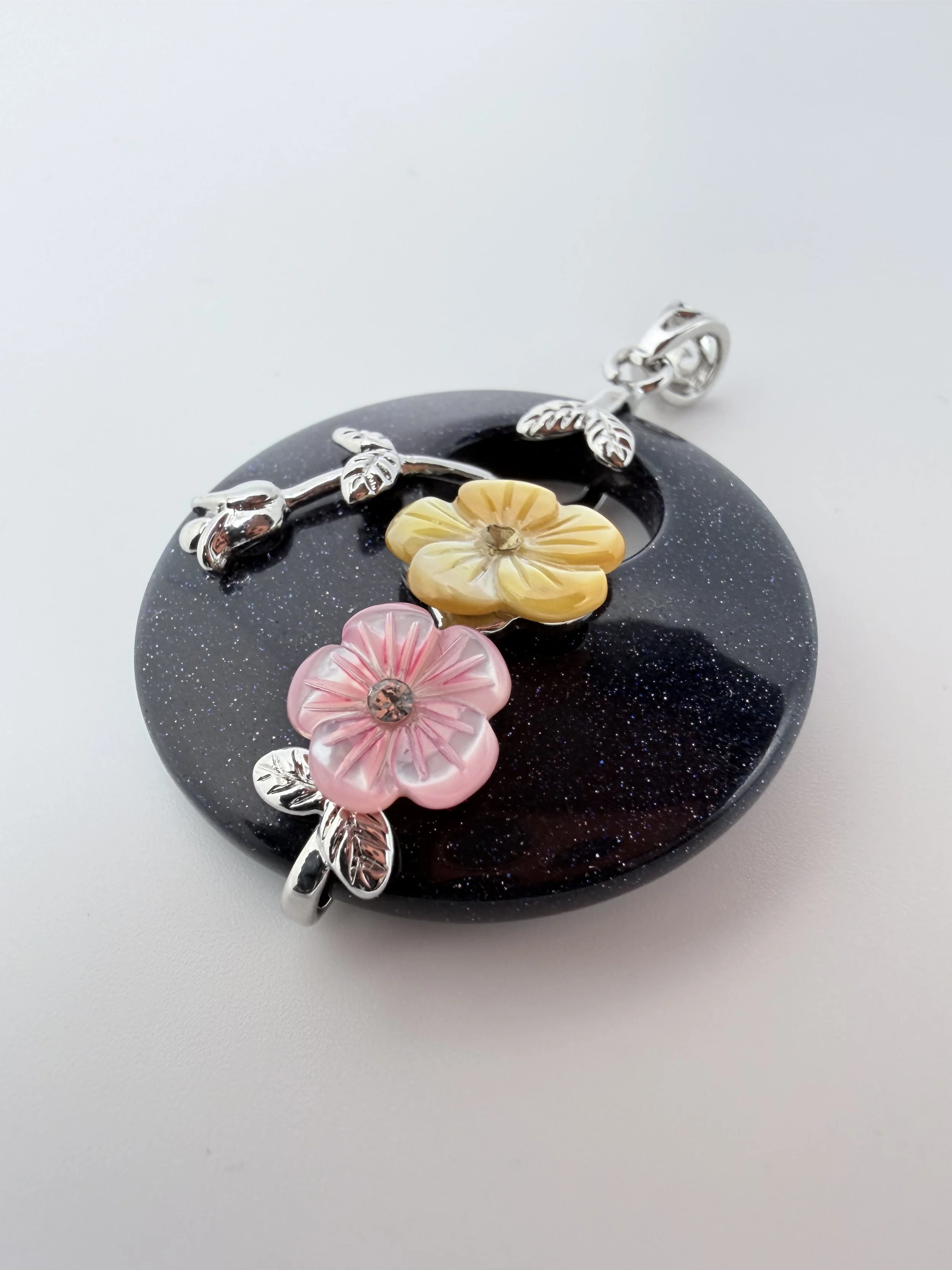 Bluestone Pendent with Sterling Silver Floral Accents