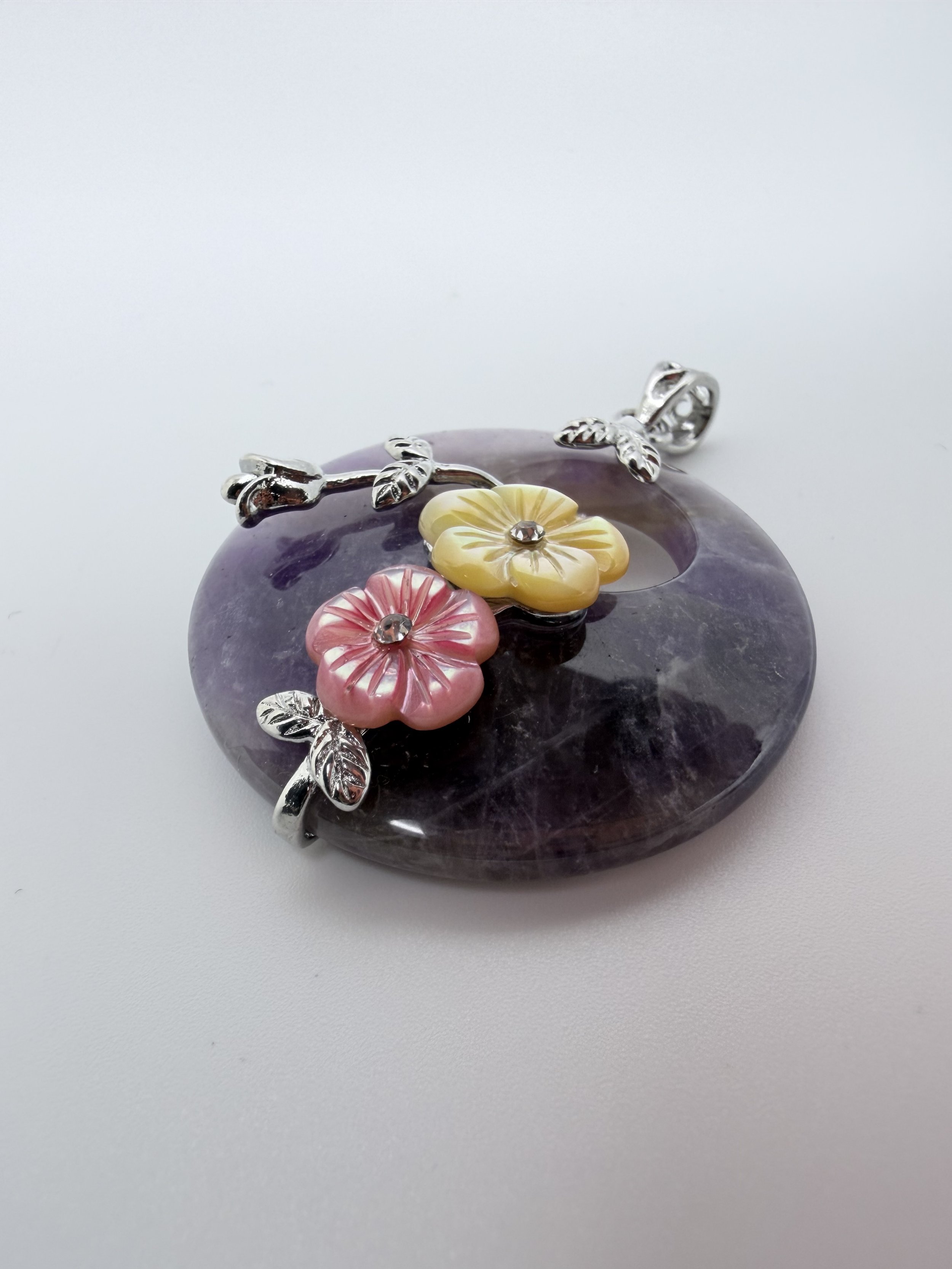 Amethyst Pendent with Sterling Silver Floral Accents