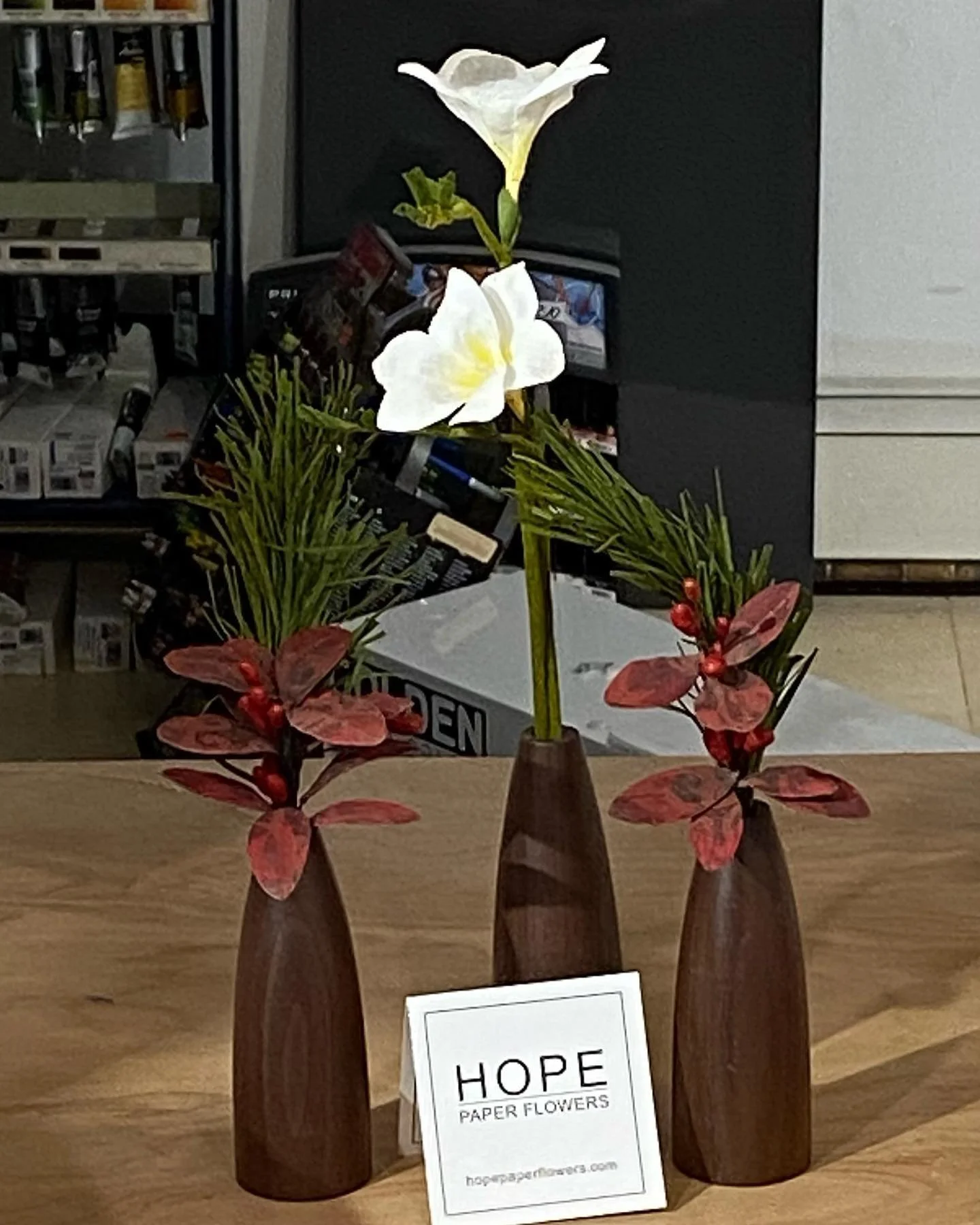 Holiday sprigs by HOPE Paper Flowers. Available at Rhinebeck Artist&rsquo;s Shop in Rhinebeck. #paperflowers #papernotpicked #rhinebeckartistshops #enjoyrhinebeck