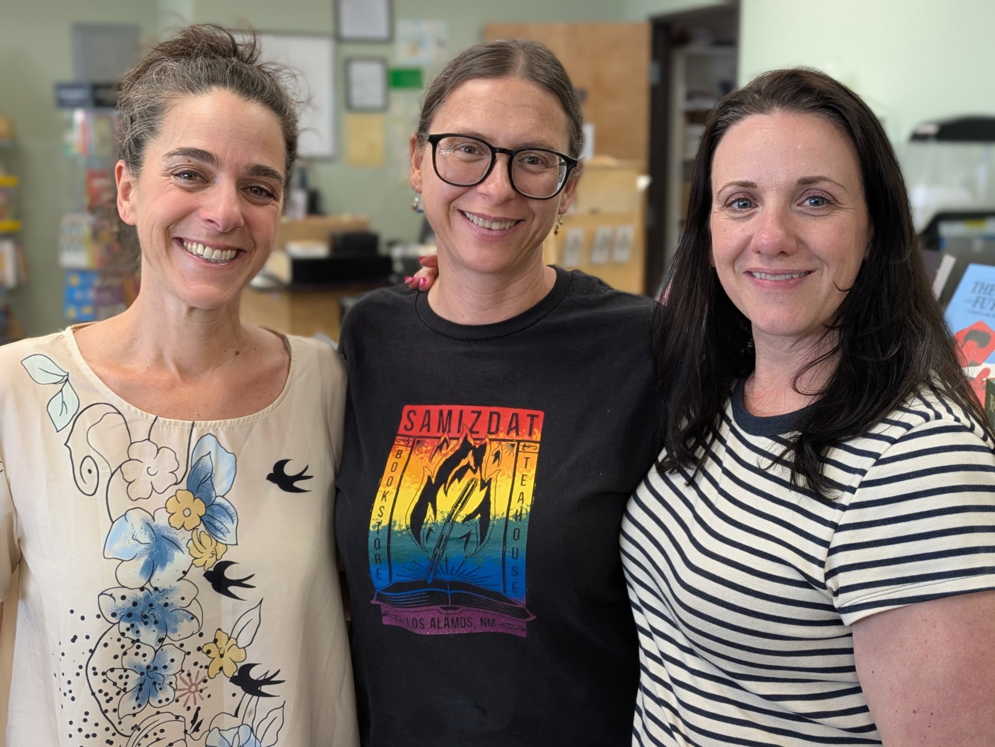 Three Women Posing for Camera at Bookstore