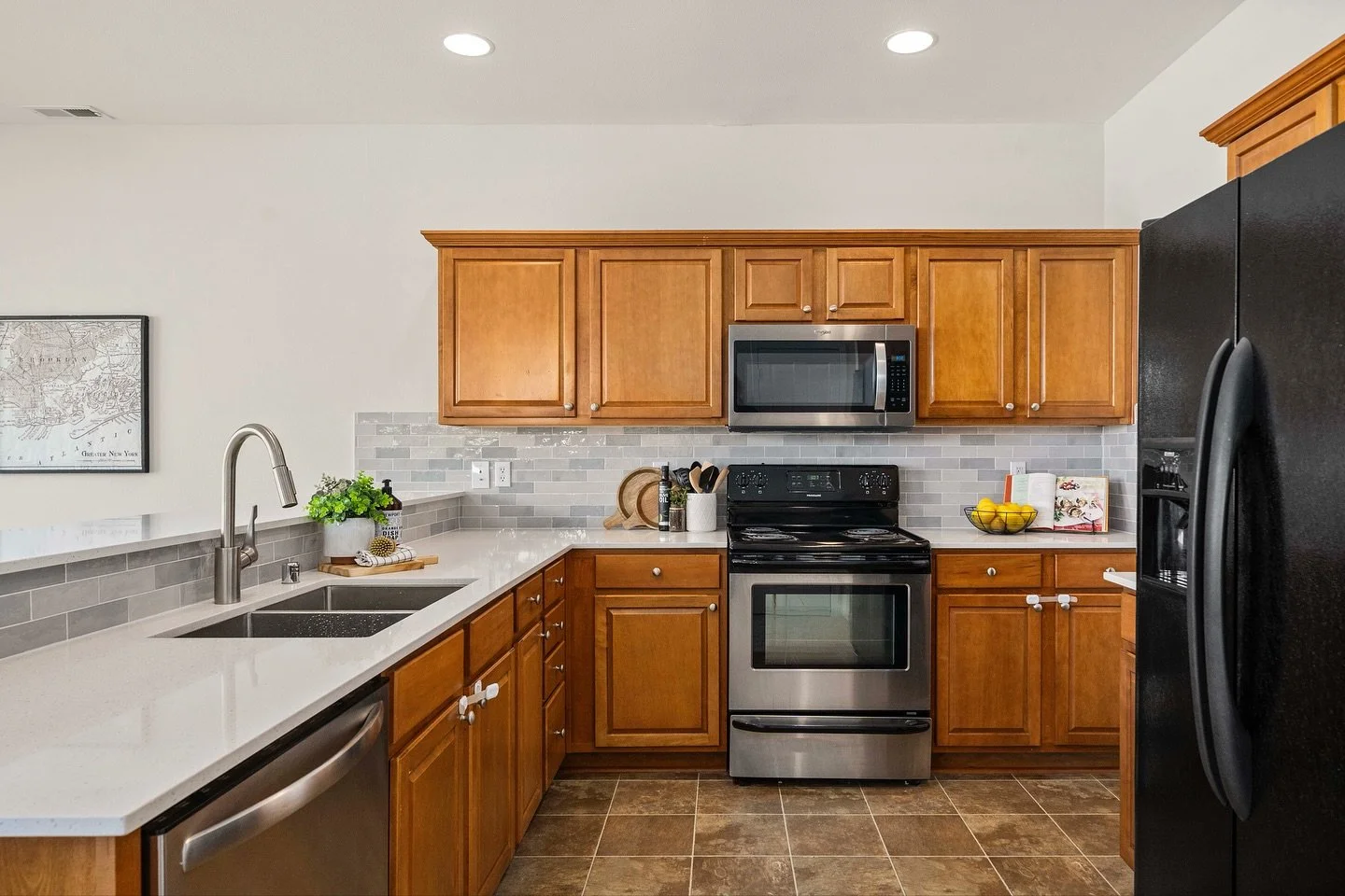 This kitchen got a simple but stunning refresh &mdash; new countertops, backsplash, and a few thoughtful updates made all the difference.

During &rarr; After: The transformation shows how upgrading surfaces can completely modernize a space without r