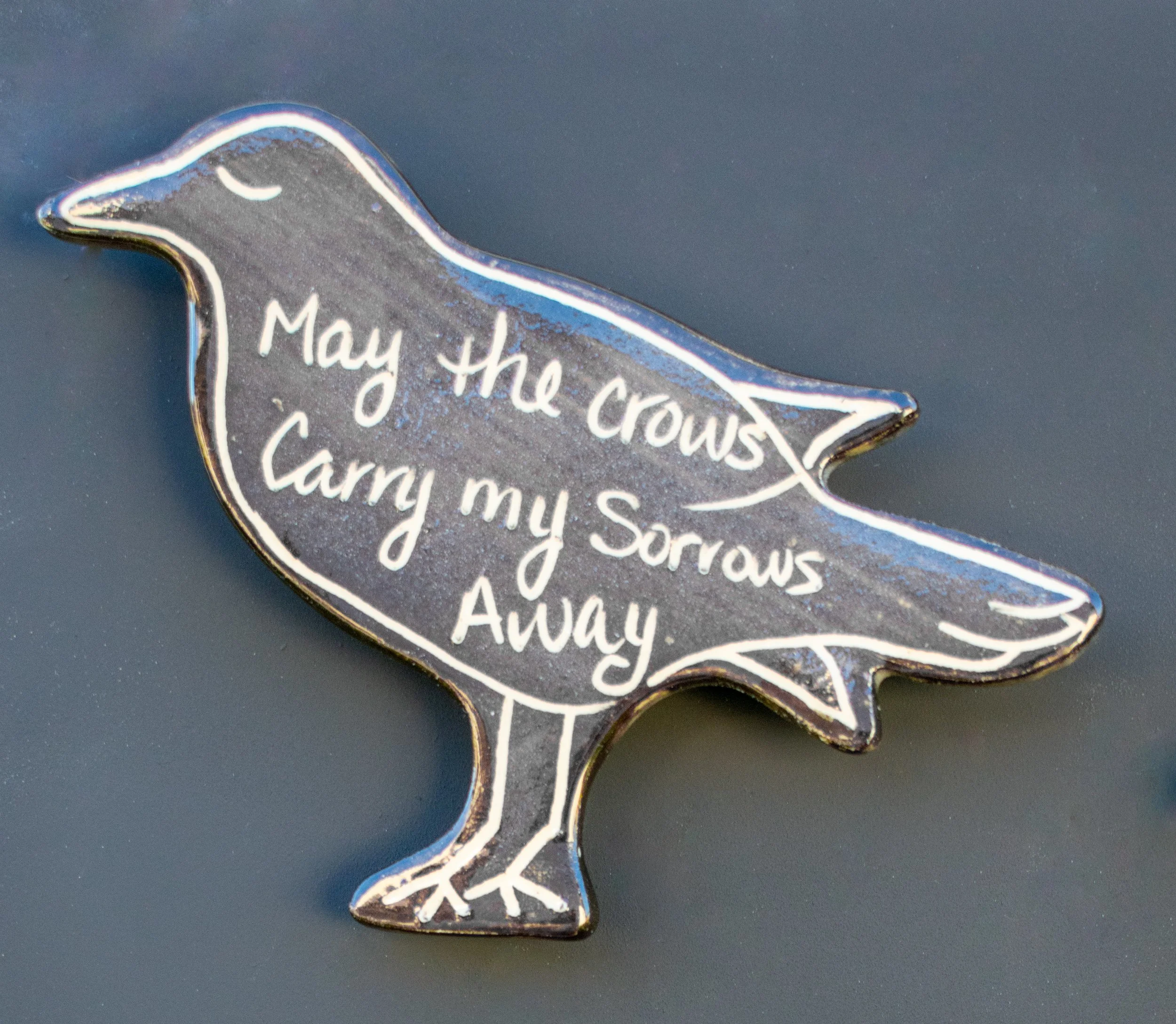 ceramic crow magnets