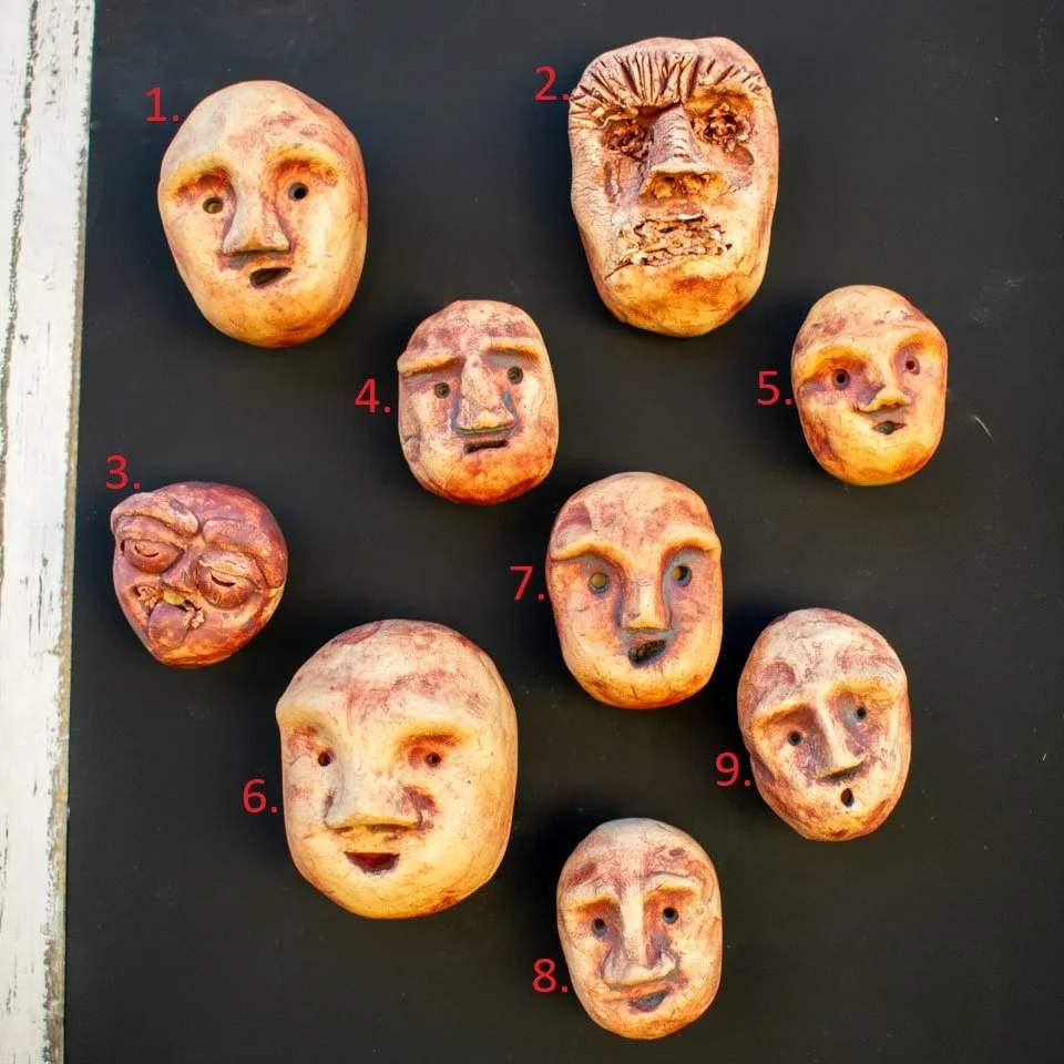 Handmade ceramic sculpture head magnets