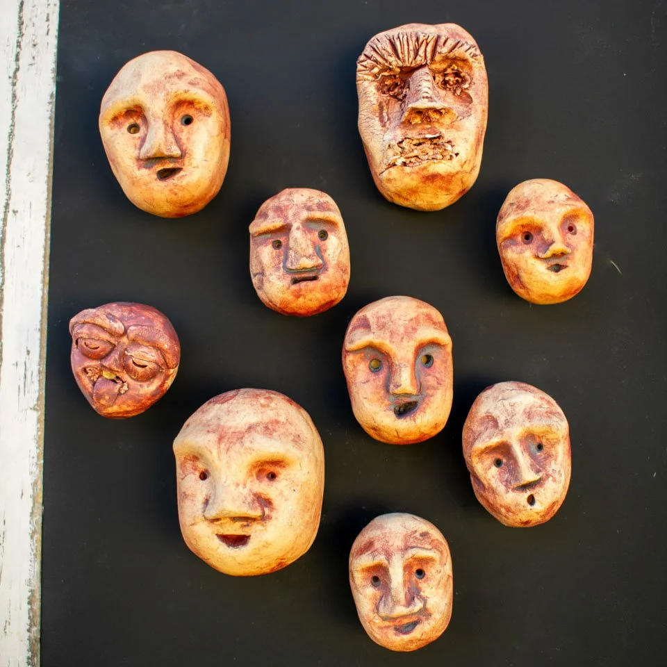 Handmade ceramic sculpture head magnets