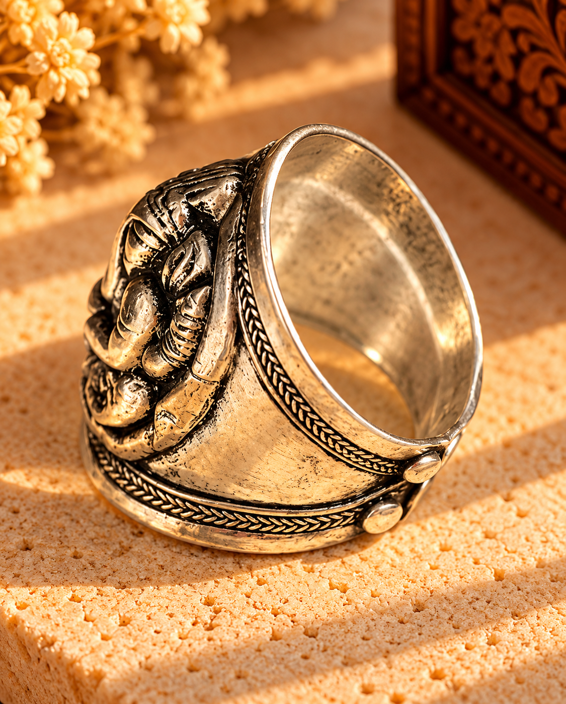 Ornate Silver Ring in Golden Light.png