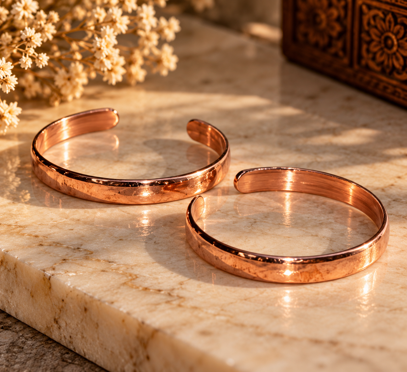 Rose-Gold Cuffs on Marble.png