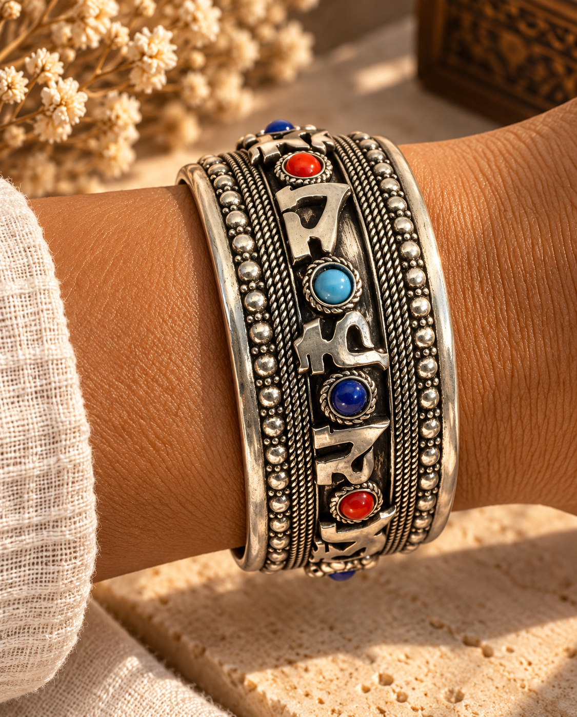 Ornate Silver Cuff in Warm Sunlight.png