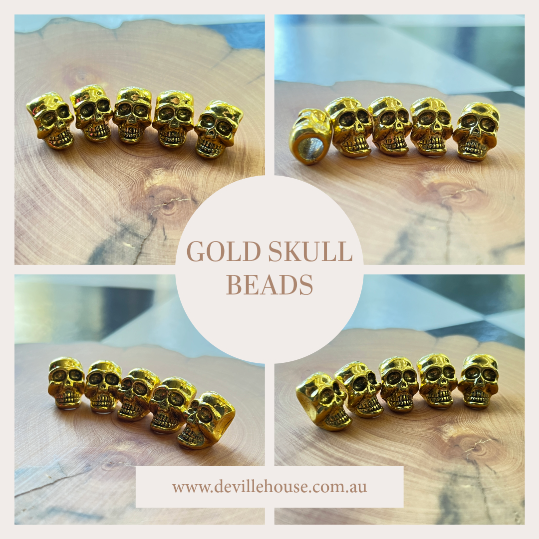 DeVille Dreadlock Gold Skull Beads.png