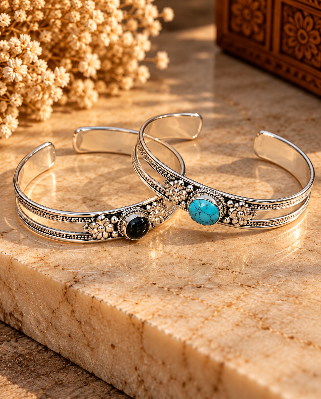 Ornate Silver Cuffs with Turquoise and Onyx.png