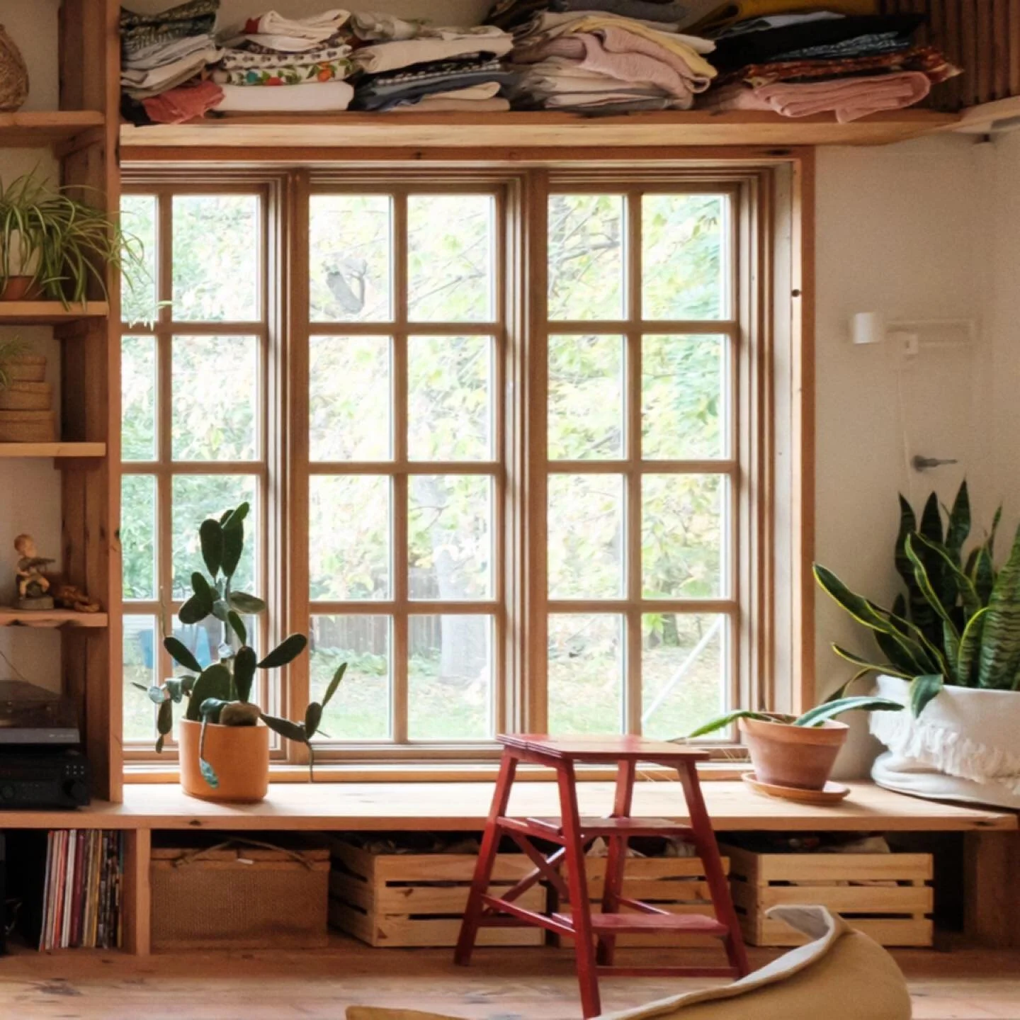 Recycled wood and reclaimed windows. Keeping the interior warm and bright.